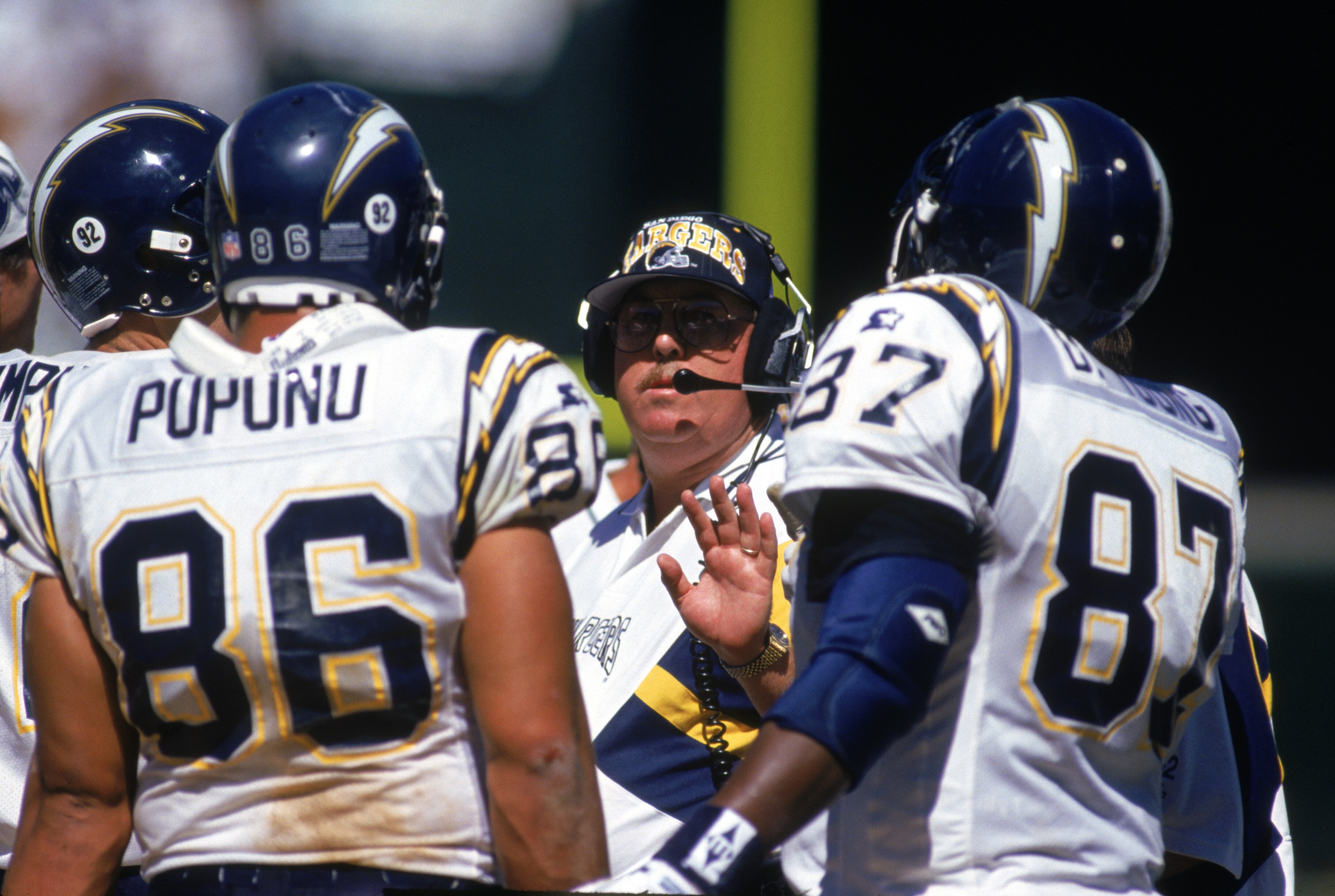 OAKLAND, CA - SEPTEMBER 3:  Offensive Coordinator Ralph Friedgen of the San Diego Chargers gives instructions to his players during a game against the Oakland Raiders at the Oakland/Alameda County Coliseum on September 3, 1995 in Oakland, California.  The