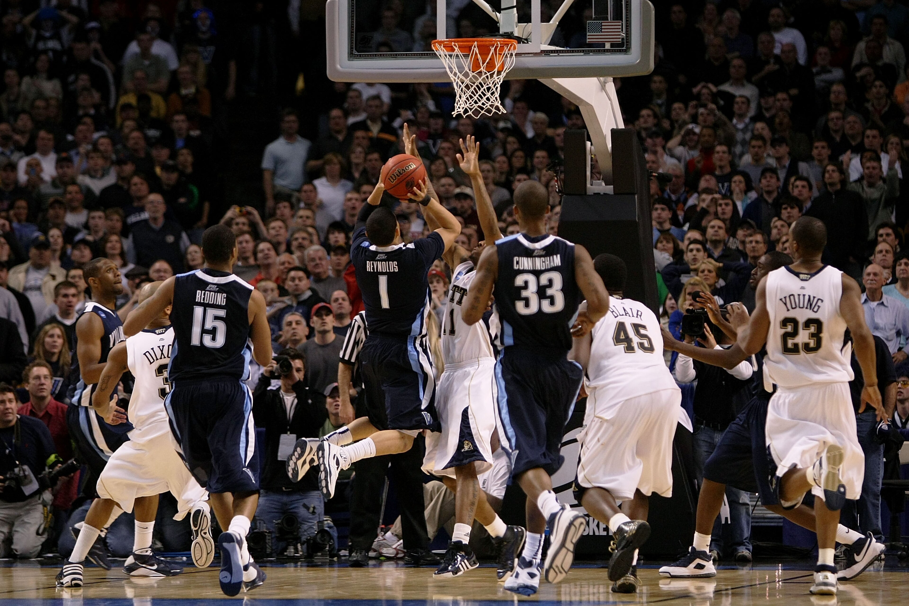 BOSTON - MARCH 28: Scottie Reynolds #1 of the Villanova Wildcats puts up the game-winning shot against the Pittsburgh Panthersduring the NCAA Men's Basketball Tournament East Regionals at TD Banknorth Garden on March 28, 2009 in Boston, Massachusetts. ( BOSTON - MARCH 28: Scottie Reynolds #1 of the Villanova Wildcats puts up the game-winning shot against the Pittsburgh Panthersduring the NCAA Men's Basketball Tournament East Regionals at TD Banknorth Garden on March 28, 2009 in Boston, Massachusetts. (
