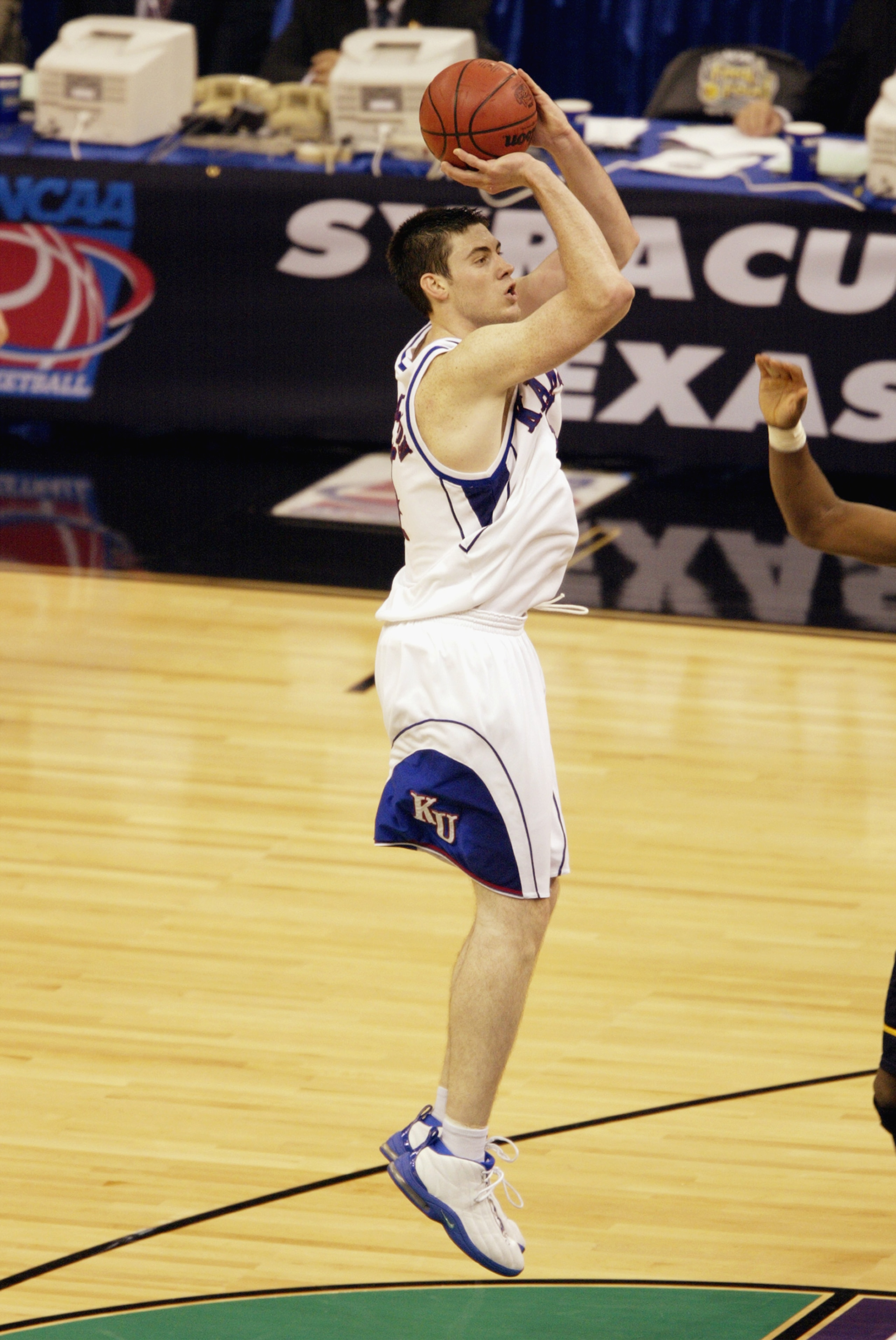 NEW ORLEANS - APRIL 5:  Nick Collison #4 of the University of Kansas Jayhawks shoots a jump shot during the semifinal round of the NCAA Final Four Tournament against Marquette University Golden Eagles at the Louisiana Superdome on April 5, 2003 in New Orl