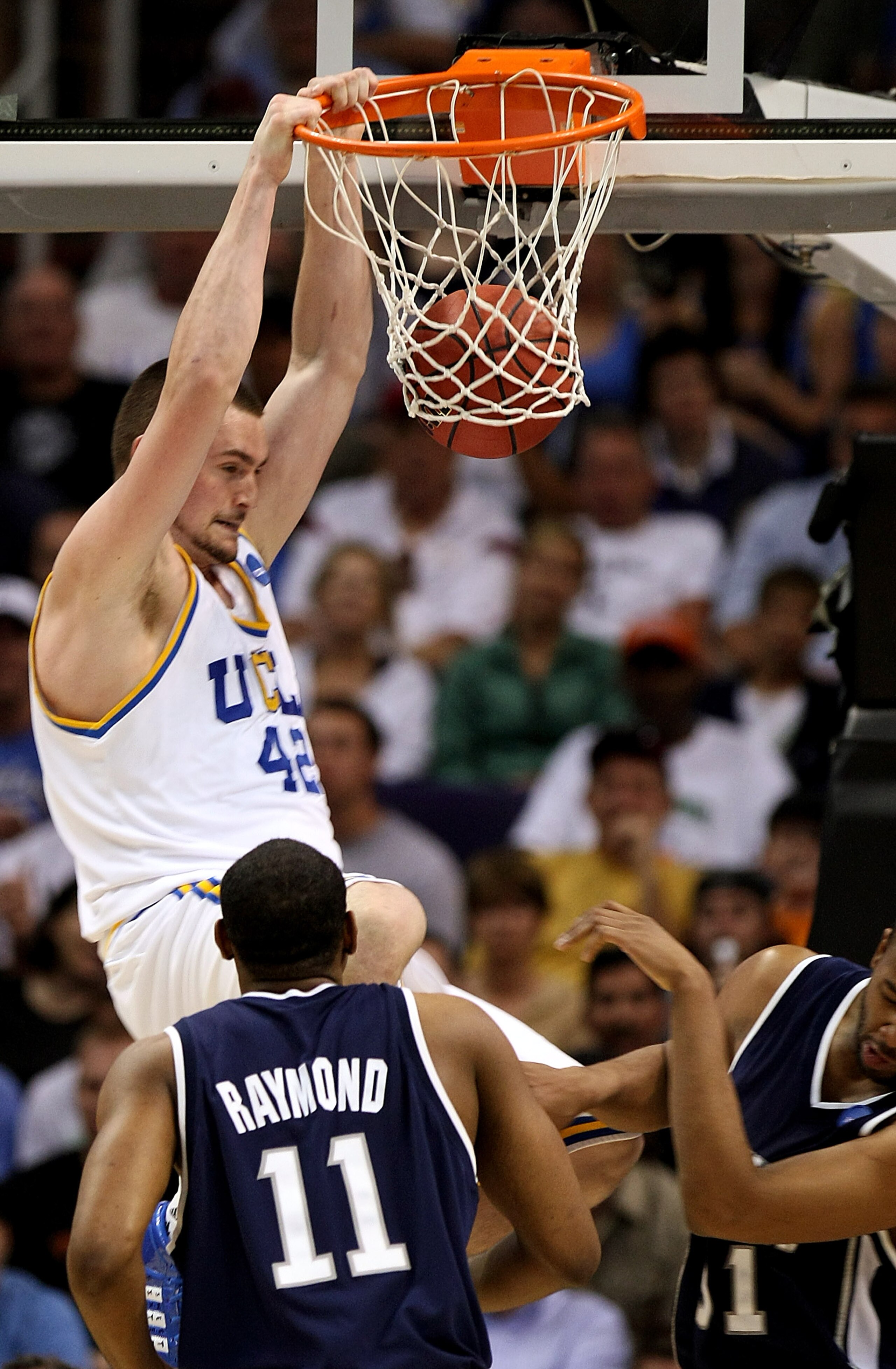 PHOENIX - MARCH 29:  Kevin Love #42 of the UCLA Bruins dunks the ball against the Xavier Musketeers during the second half of the West Regional Final at the U.S. Airways Center on March 29, 2008 in Phoenix, Arizona.  (Photo by Stephen Dunn/Getty Images)