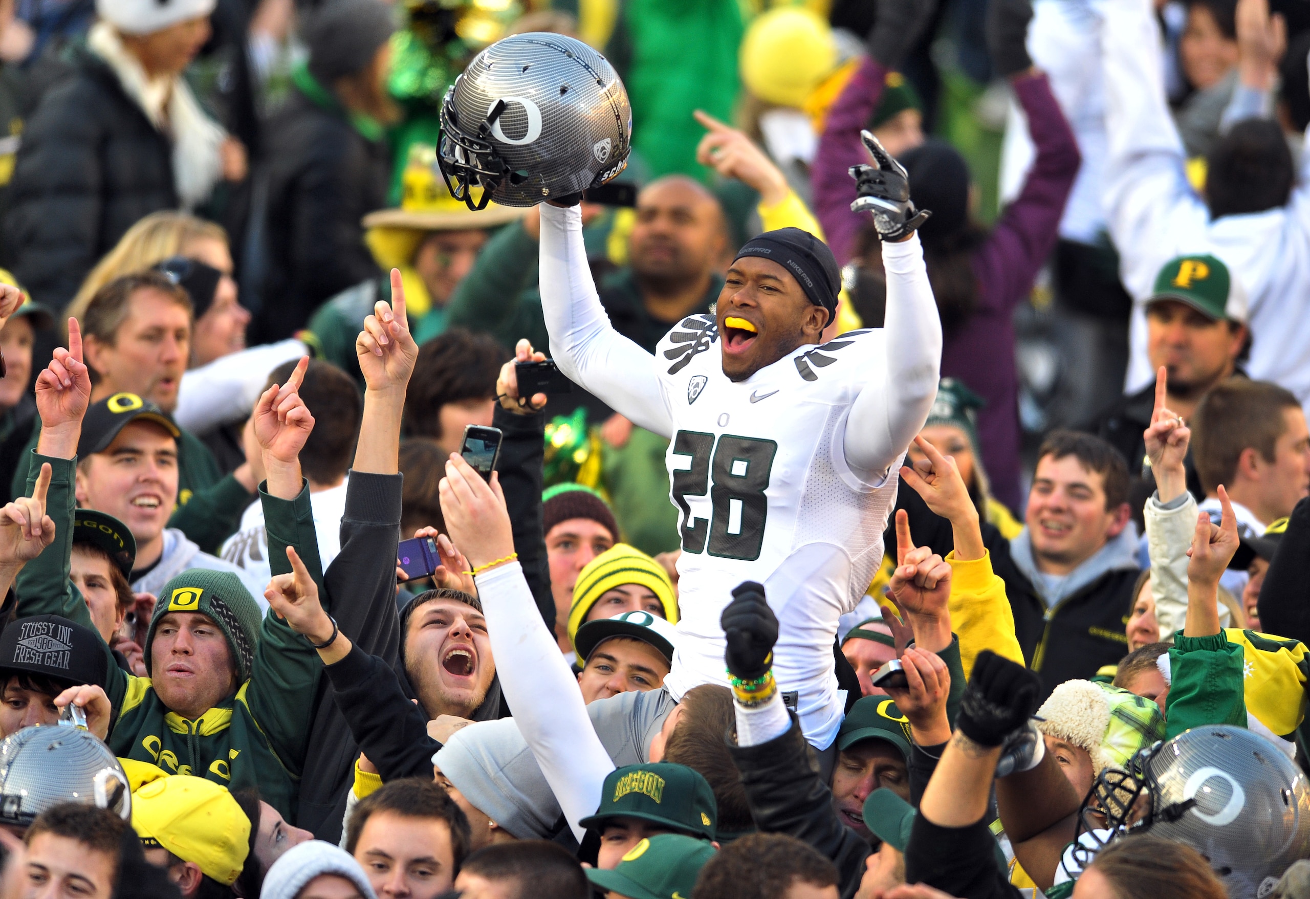 CORVALLIS, OR - DECEMBER 4: Cornerback Scott Grady #28 of the Oregon Ducks celebrates on the field after the game at Reser Stadium on December 4, 2010 in Corvallis, Oregon. he Ducks beat the Beavers 37-20 to likely go on the BCS Championship game at the T