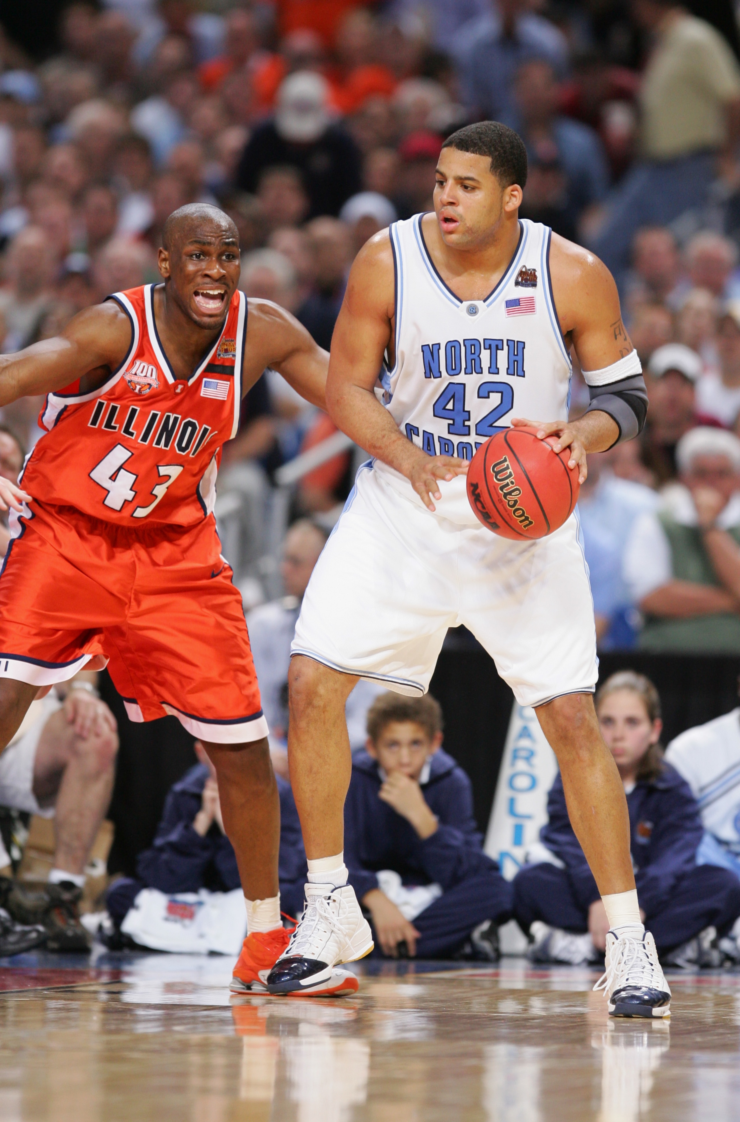 ST. LOUIS, MO - APRIL 4:  Sean May #42 of the University of North Carolina at Chapel Hill Tar Heels is defended by Roger Powell, Jr. #43 of the University of Illinois at Urbana-Champaign Fighting Illini during the NCAA Men's National Championship at the E