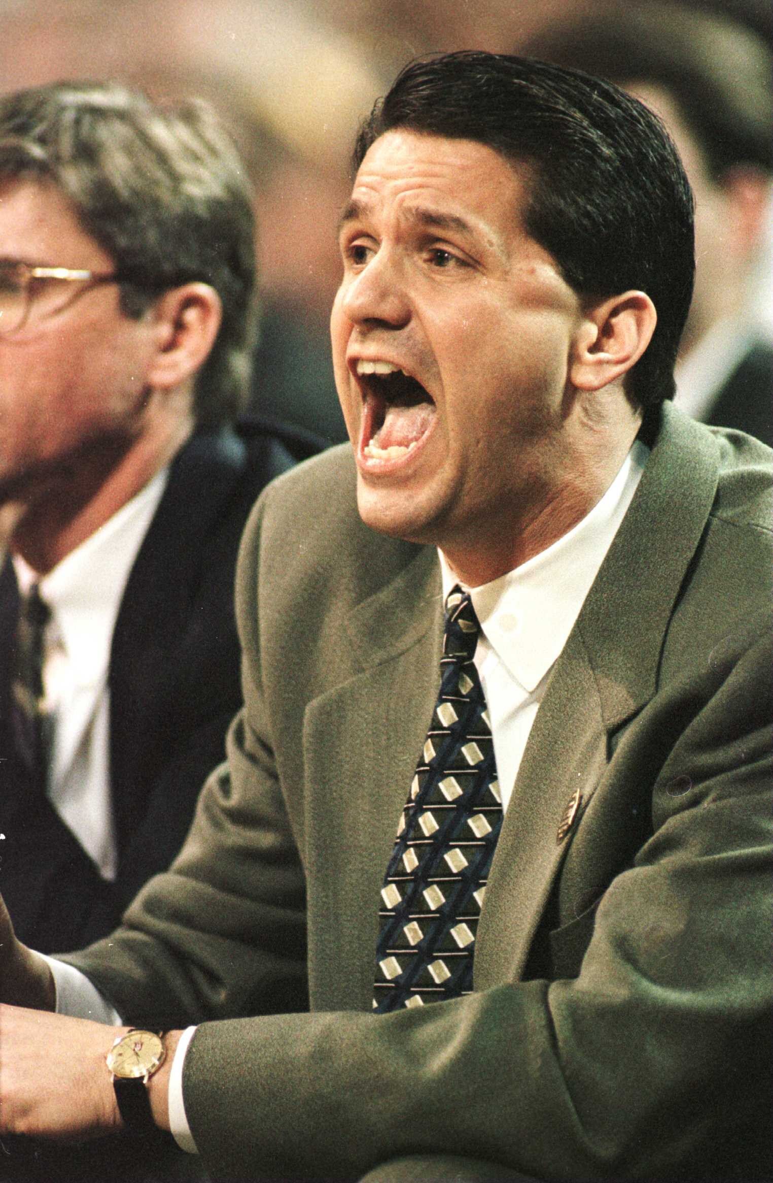 22 Mar 1996: Coach John Calipari of UMass shouts instructions to his team during the first half of the NCAA East Regional Men''s Basketball game played at the Georgia Dome in Atlanta, Georgia.