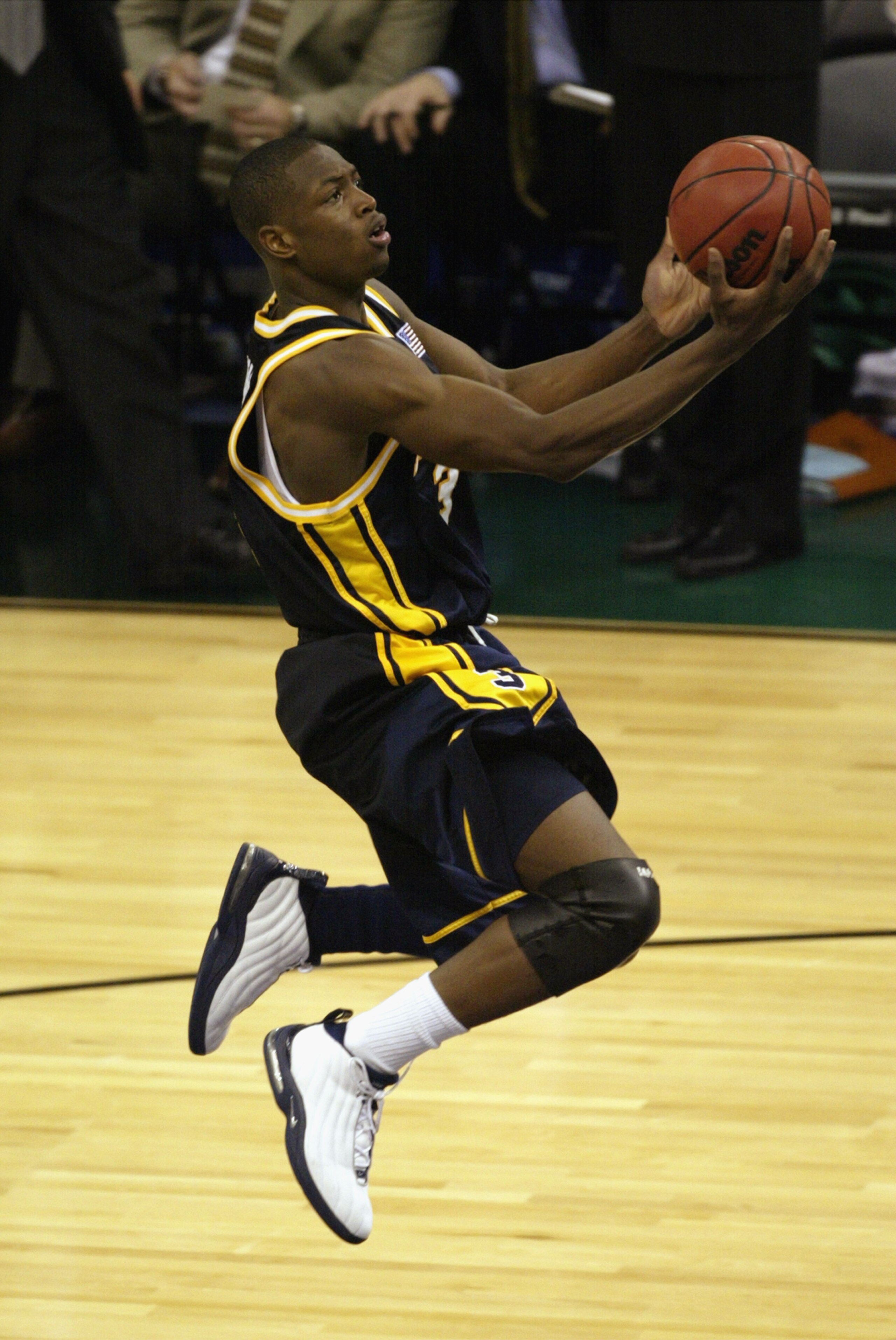 NEW ORLEANS - APRIL 5:  Dwyane Wade #3 of Marquette University Golden Eagles drives to the basket during the semifinal round of the NCAA Final Four Tournament against the University of Kansas Jayhawks at the Louisiana Superdome on April 5, 2003 in New Orl