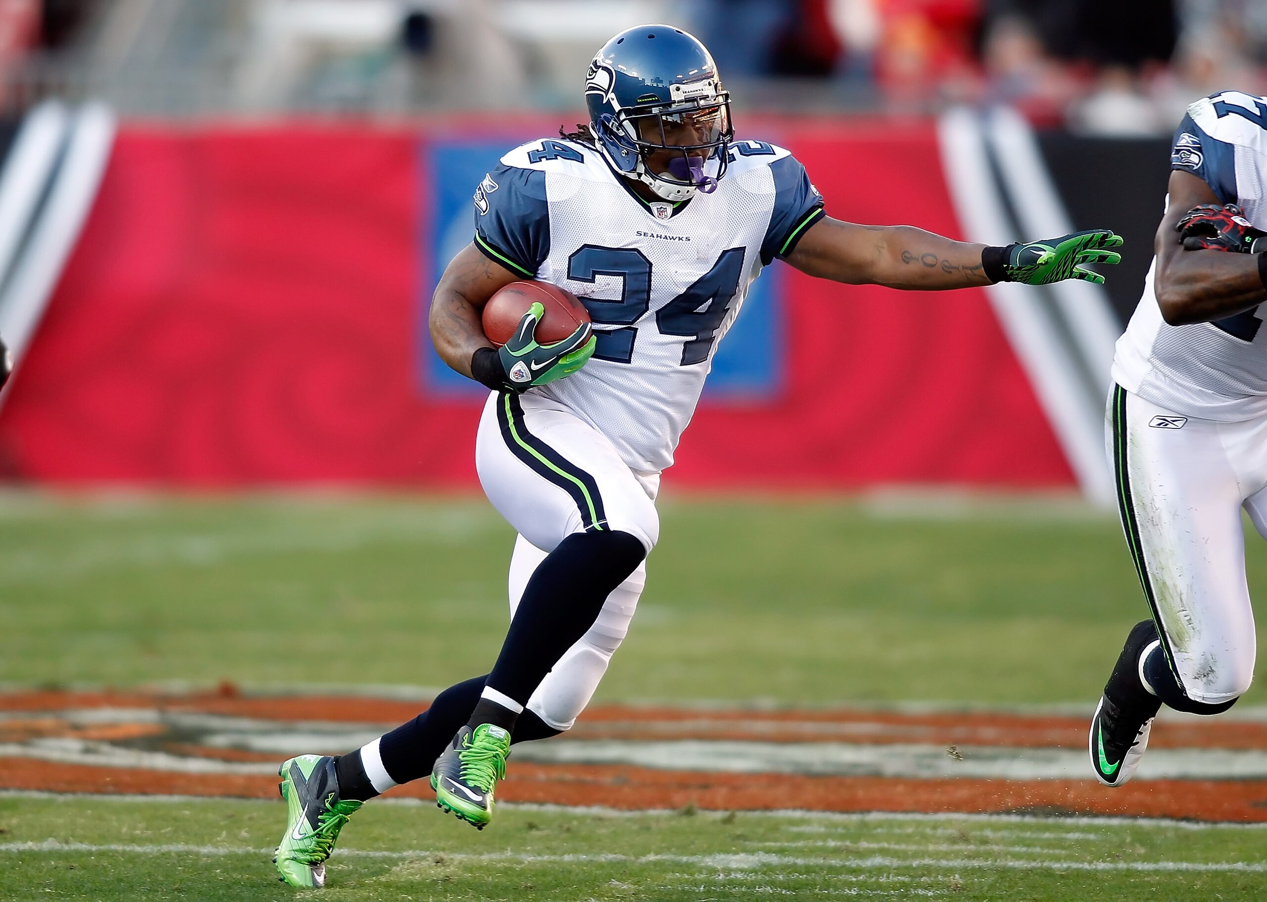TAMPA, FL - DECEMBER 26: Running back Marshawn Lynch #24 of the Seattle Seahawks runs the ball against the Tampa Bay Buccaneers during the game at Raymond James Stadium on December 26, 2010 in Tampa, Florida. (Photo by J. Meric/Getty Images) TAMPA, FL - DECEMBER 26: Running back Marshawn Lynch #24 of the Seattle Seahawks runs the ball against the Tampa Bay Buccaneers during the game at Raymond James Stadium on December 26, 2010 in Tampa, Florida. (Photo by J. Meric/Getty Images)