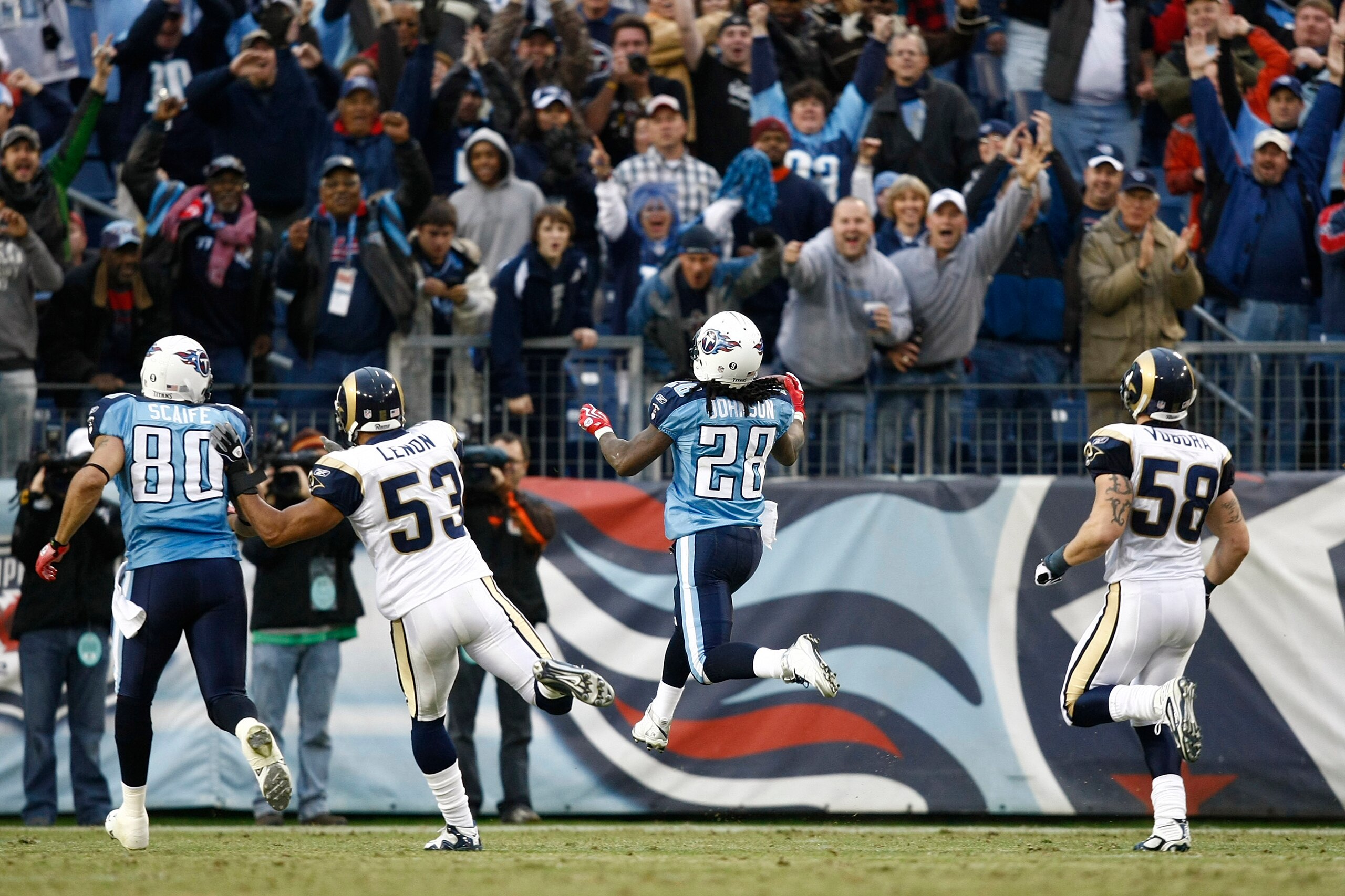 NASHVILLE, TN - DECEMBER 13: Chris Johnson #28 of the Tennessee Titans jumps across the goal line to score his second touchdown in the first half against the St. Louis Rams at LP Field on December 13, 2009 in Nashville, Tennessee. (Photo by Joe Robbins/Ge