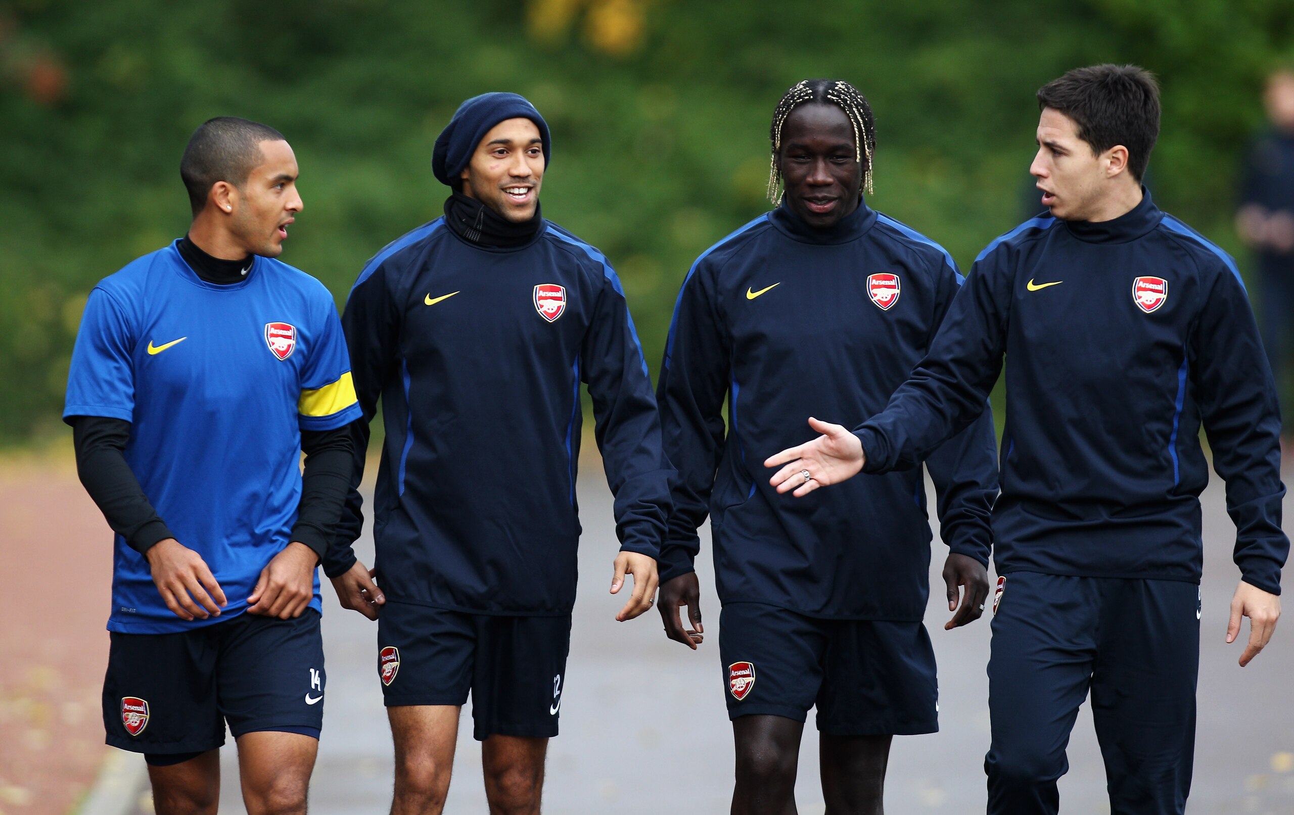 ST ALBANS, ENGLAND - NOVEMBER 02:  (L-R)  Theo Walcott, Gael Clichy, Bacary Sagna and Samir Nasri share a laugh prior to the training session ahead of the UEFA Champions League Group H match against Shakhtar Donetsk at the club's complex at London Colney