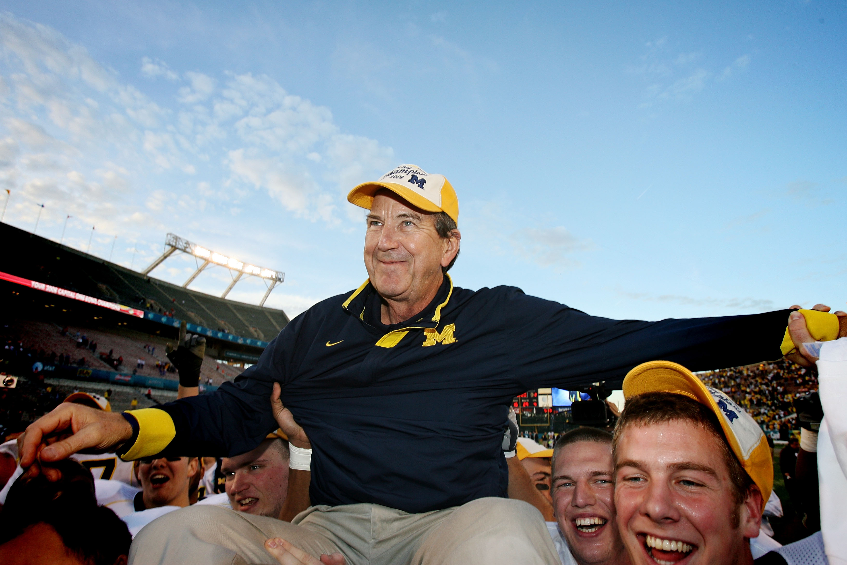 ORLANDO, FL - JANUARY 01:  Head coach Lloyd Carr of the Michigan Wolverines is carried off the field after ending his coaching career with a victory over the Florida Gators in the Capital One Bowl at Florida Citrus Bowl on January 1, 2008 in Orlando, Flor