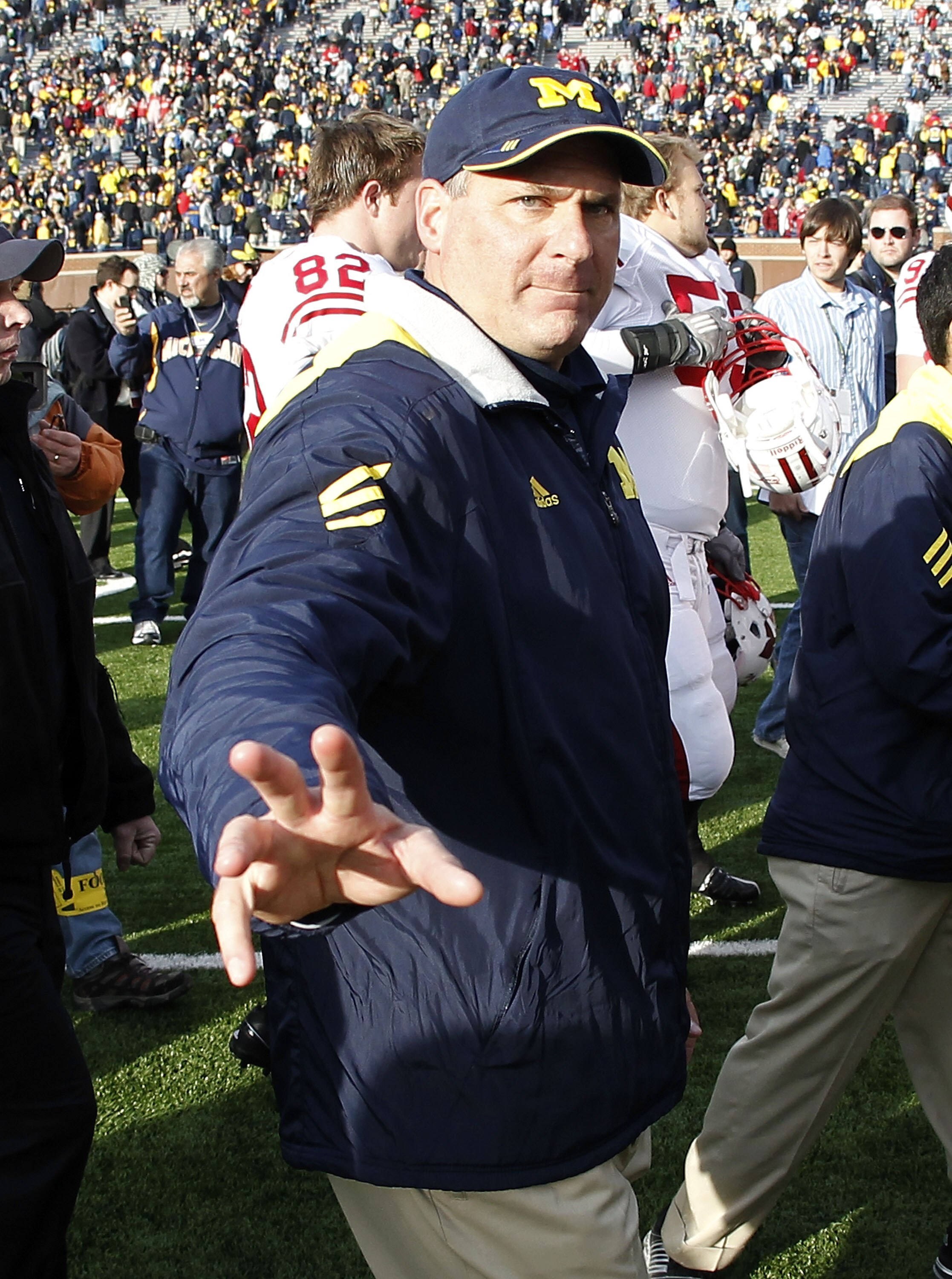ANN ARBOR, MI - NOVEMBER 20: Head coach Rich Rodriguez of the Michigan Wolverines leaves the field after losing 28-48 to the Wisconson Badgers at Michigan Stadium on November 20, 2010 in Ann Arbor, Michigan.  (Photo by Gregory Shamus/Getty Images)