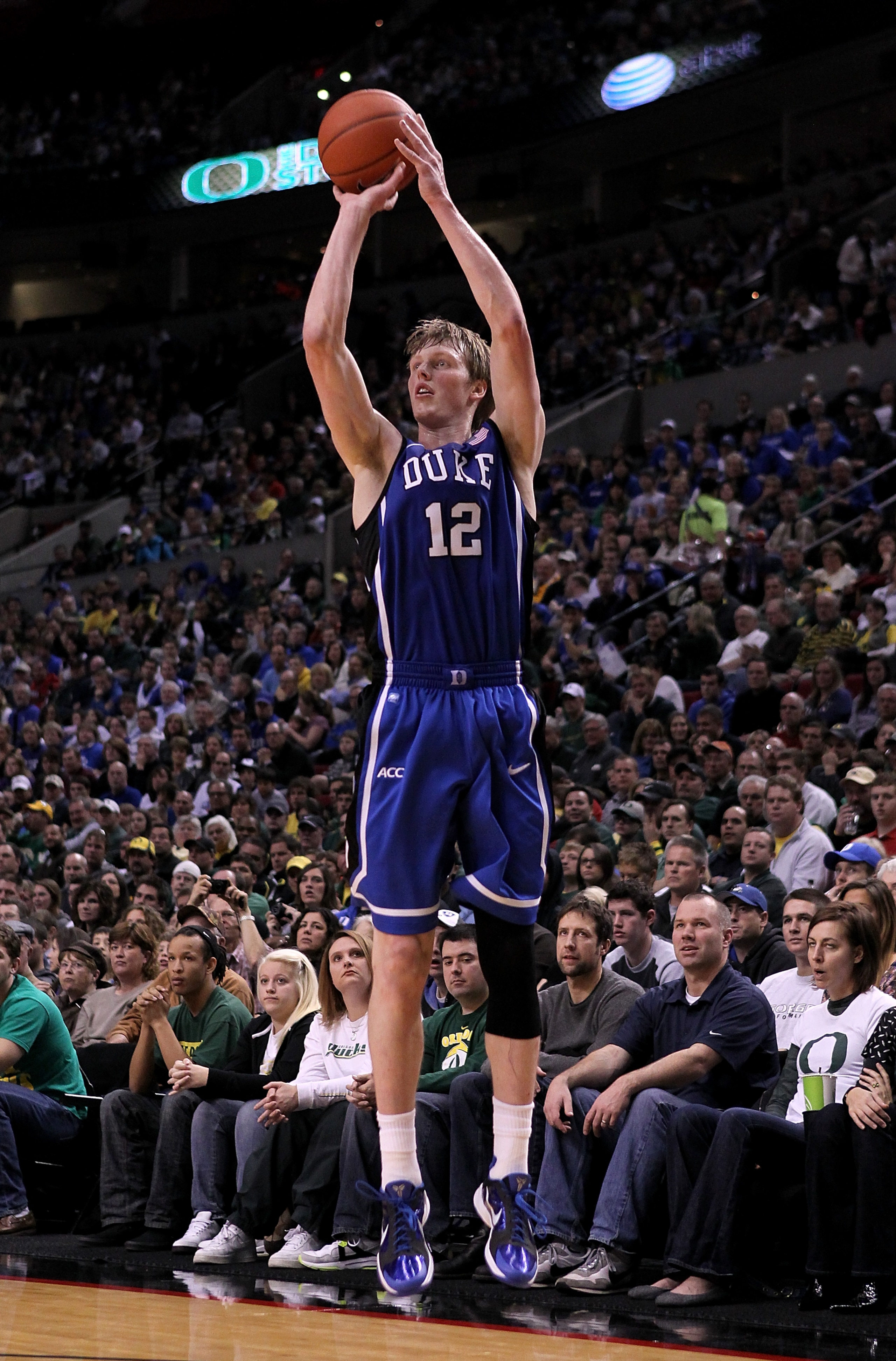 PORTLAND, OR - NOVEMBER 27:  Kyle Singler #12 of the Duke Blue Devils shoots a three pointer against the Oregon Ducks on November 27, 2010 at the Rose Garden in Portland, Oregon.  (Photo by Jonathan Ferrey/Getty Images)