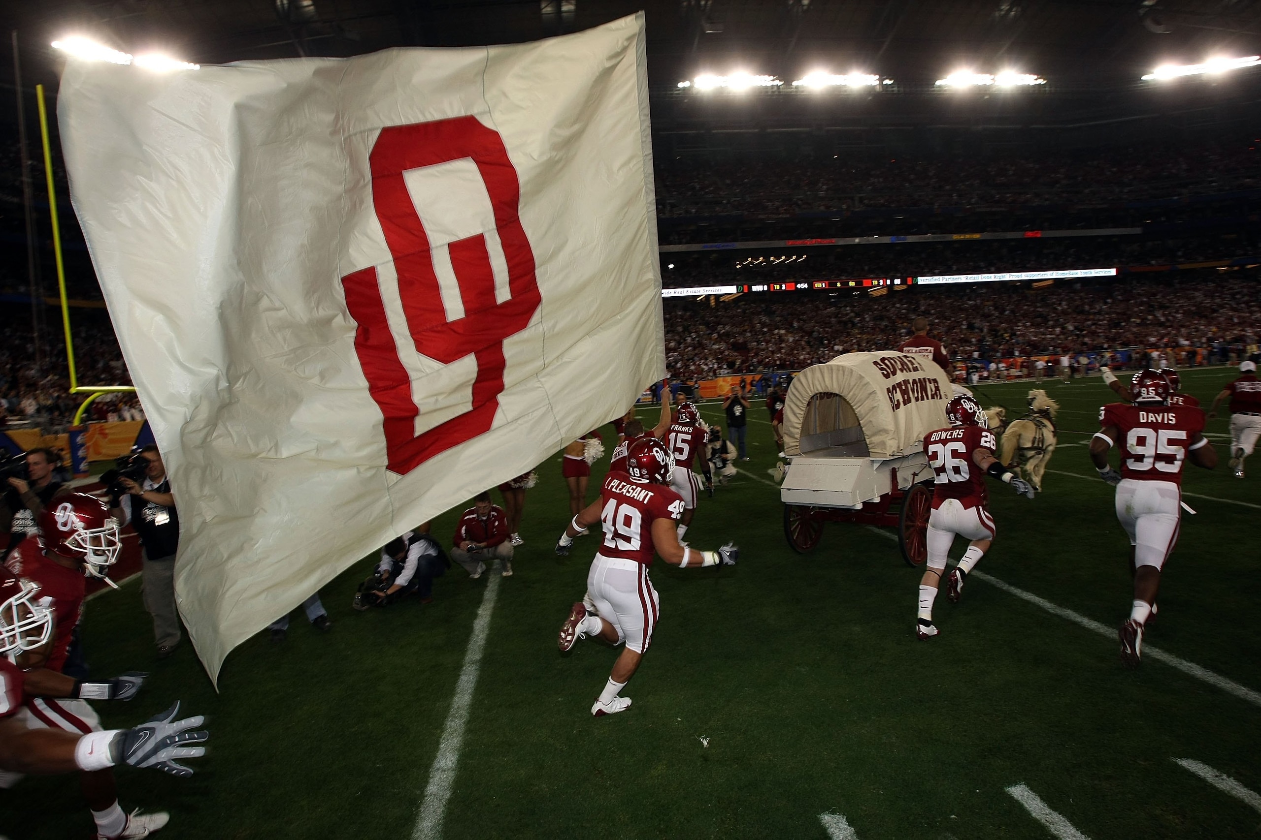 GLENDALE, AZ - JANUARY 02:  Oklahoma Sooner Schooner runs onto the field as the Sooner players follow before the Sooners take on the West Virginia Mountaineers at the Tostito's Fiesta Bowl at University of Phoenix Stadium January 2, 2008 in Glendale, Ariz
