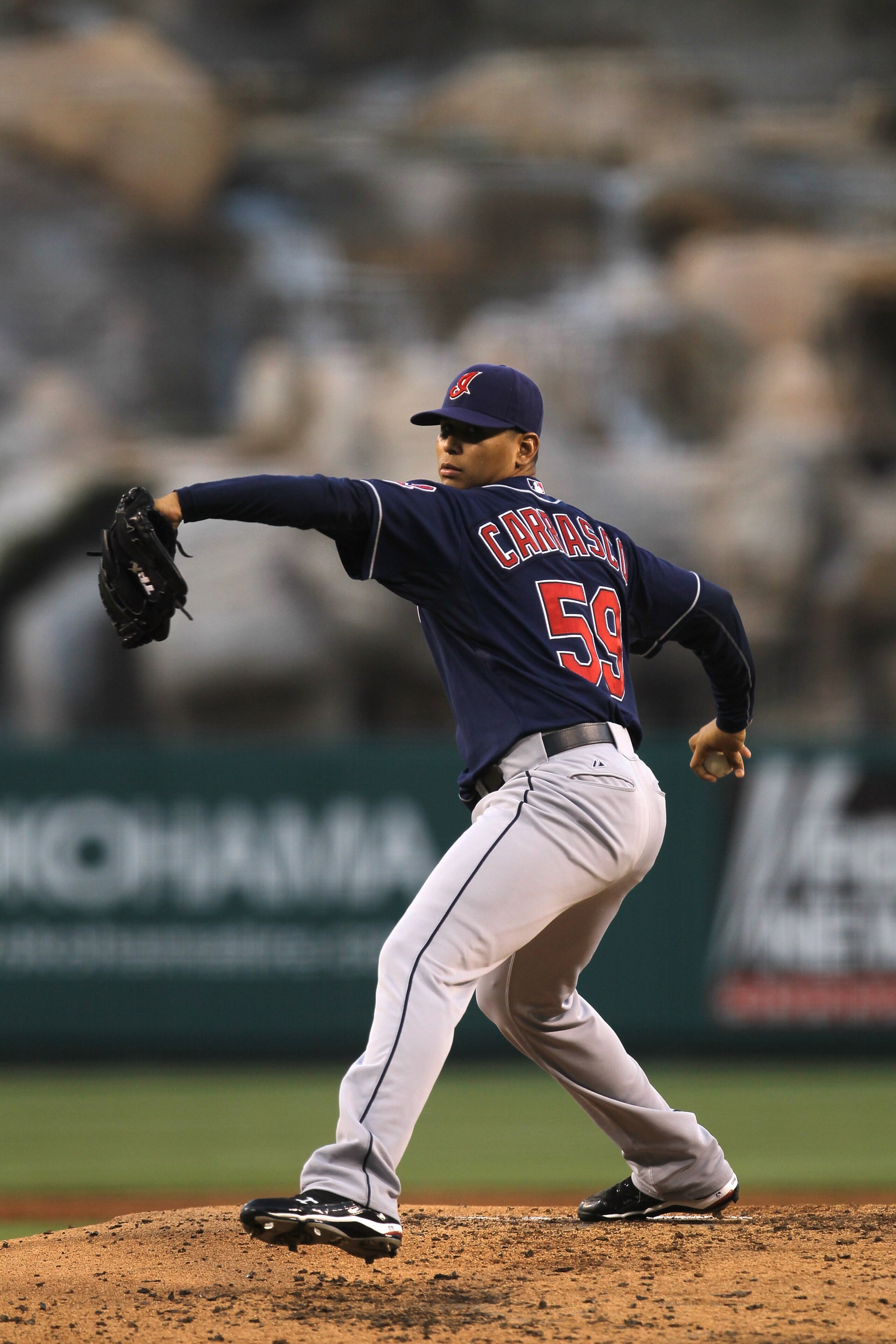 ANAHEIM, CA - SEPTEMBER 06:  Carlos Carrasco #59 of the Cleveland Indians throws a pitch against the Los Angeles Angels of Anaheim on September 6, 2010 at Angel Stadium in Anaheim, California.  (Photo by Stephen Dunn/Getty Images)