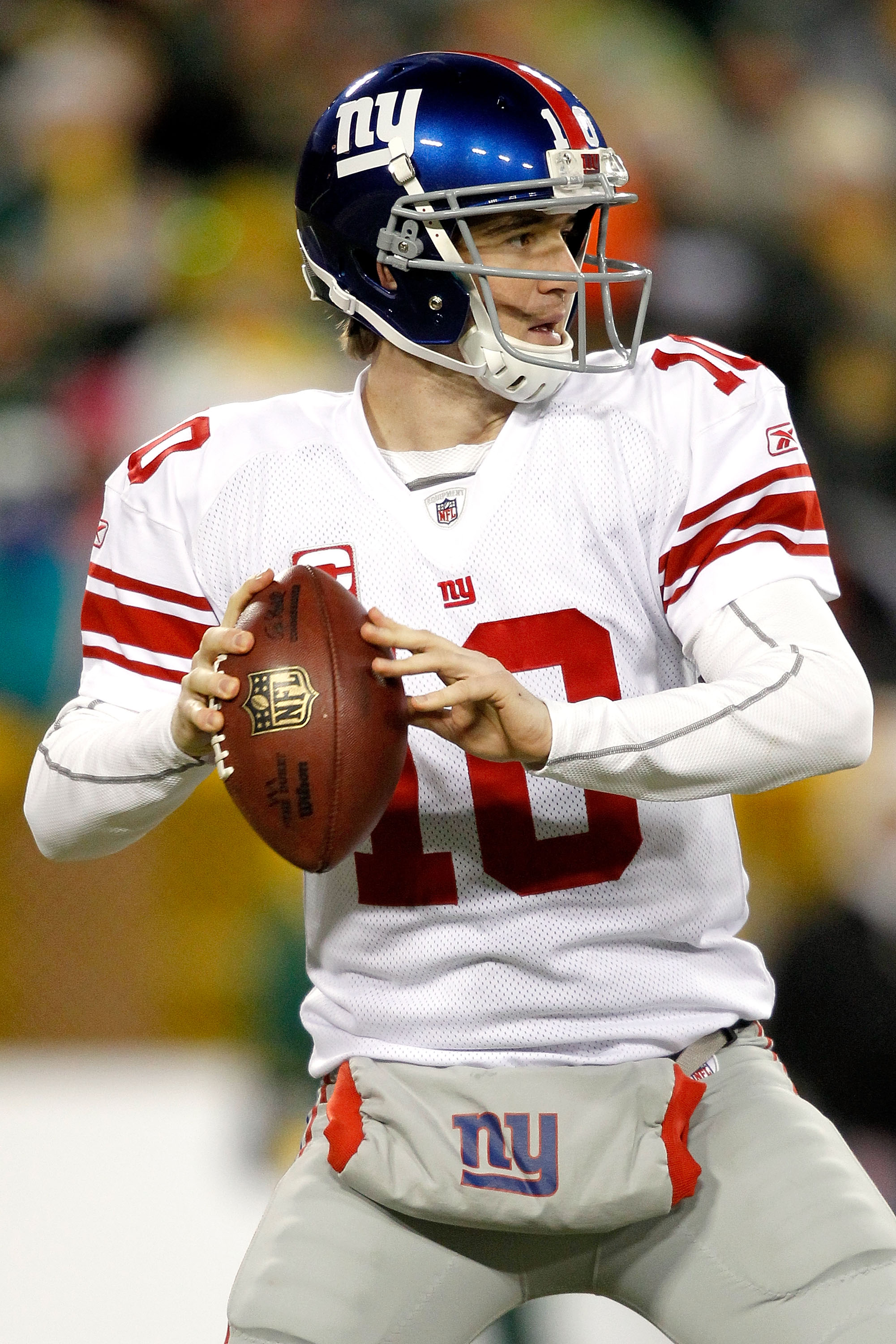 GREEN BAY, WI - DECEMBER 26: Eli Manning #10 of the New York Giants throws against the Green Bay Packers at Lambeau Field on December 26, 2010 in Green Bay, Wisconsin. (Photo by Matthew Stockman/Getty Images) GREEN BAY, WI - DECEMBER 26: Eli Manning #10 of the New York Giants throws against the Green Bay Packers at Lambeau Field on December 26, 2010 in Green Bay, Wisconsin. (Photo by Matthew Stockman/Getty Images)