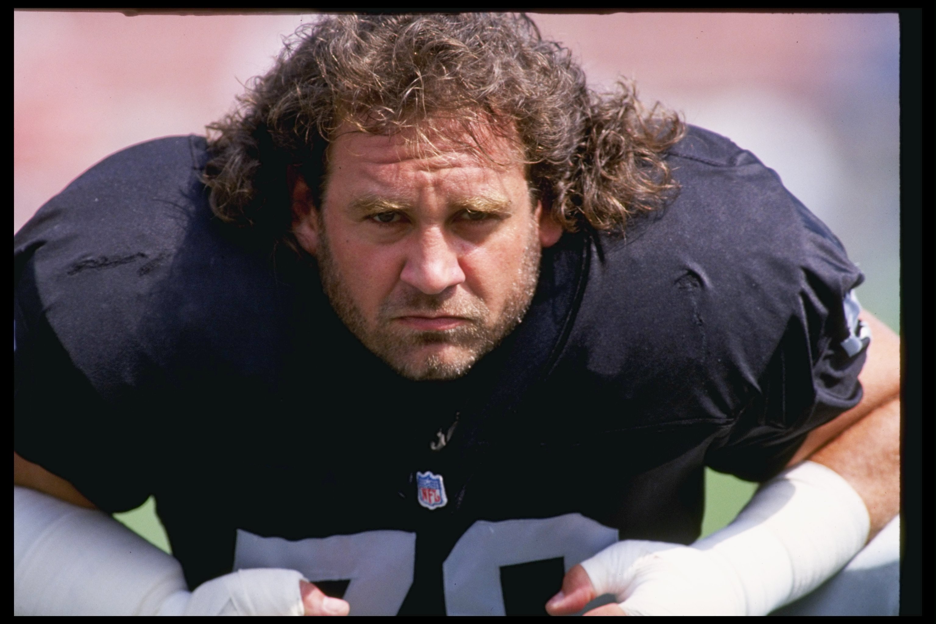 6 Oct 1991: Left tackle Bob Golic of the Los Angeles Raiders warms up before a game against the San Diego Chargers at the Los Angeles Coliseum in Los Angeles, California. The Chargers won the game 21-13.