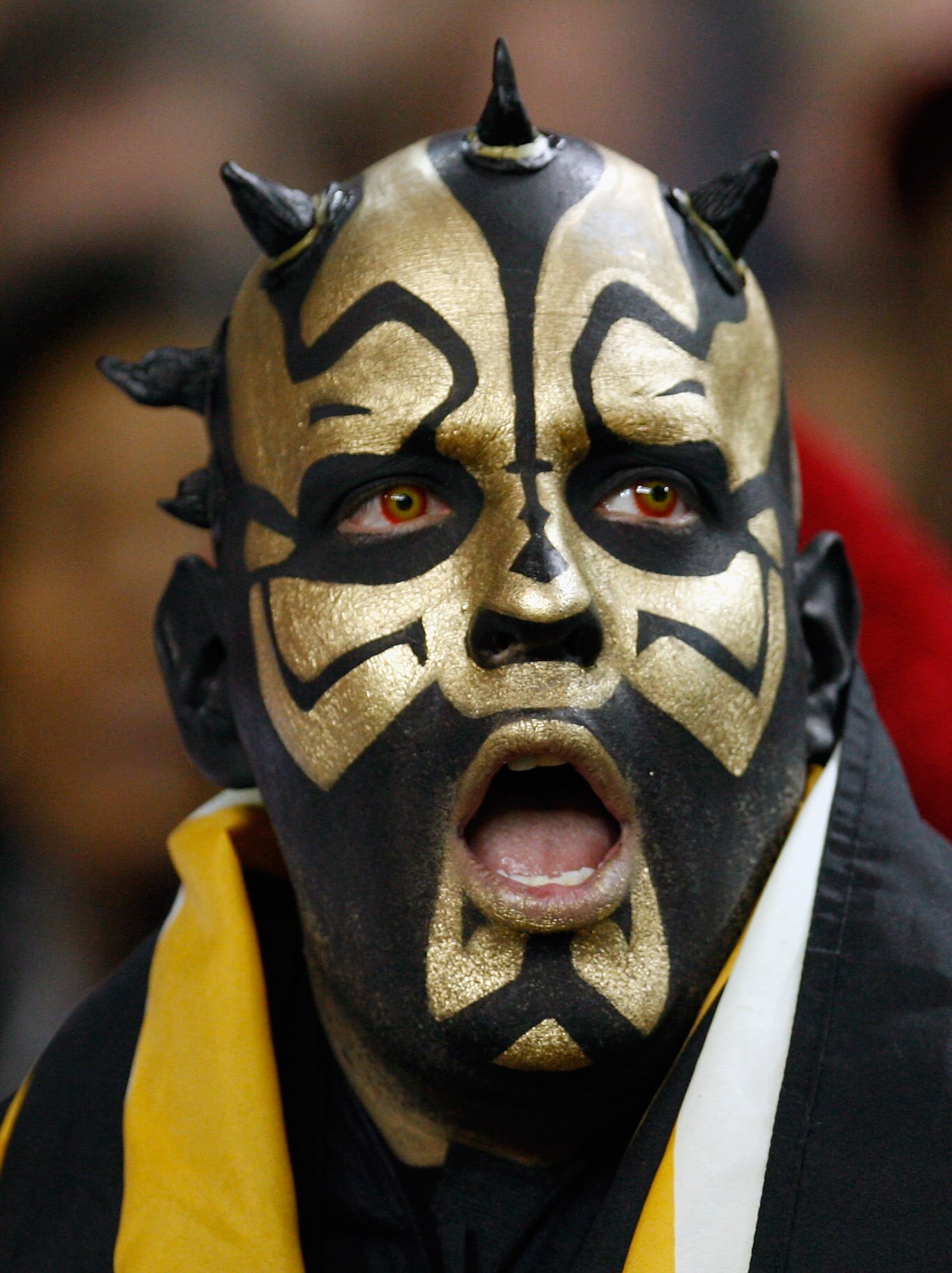 ATLANTA, GA - DECEMBER 27:  A New Orleans Saints fan watches the action during their game against the Altanta Falcosn at the Georgia Dome on December 27, 2010 in Atlanta, Georgia.  (Photo by Scott Halleran/Getty Images)