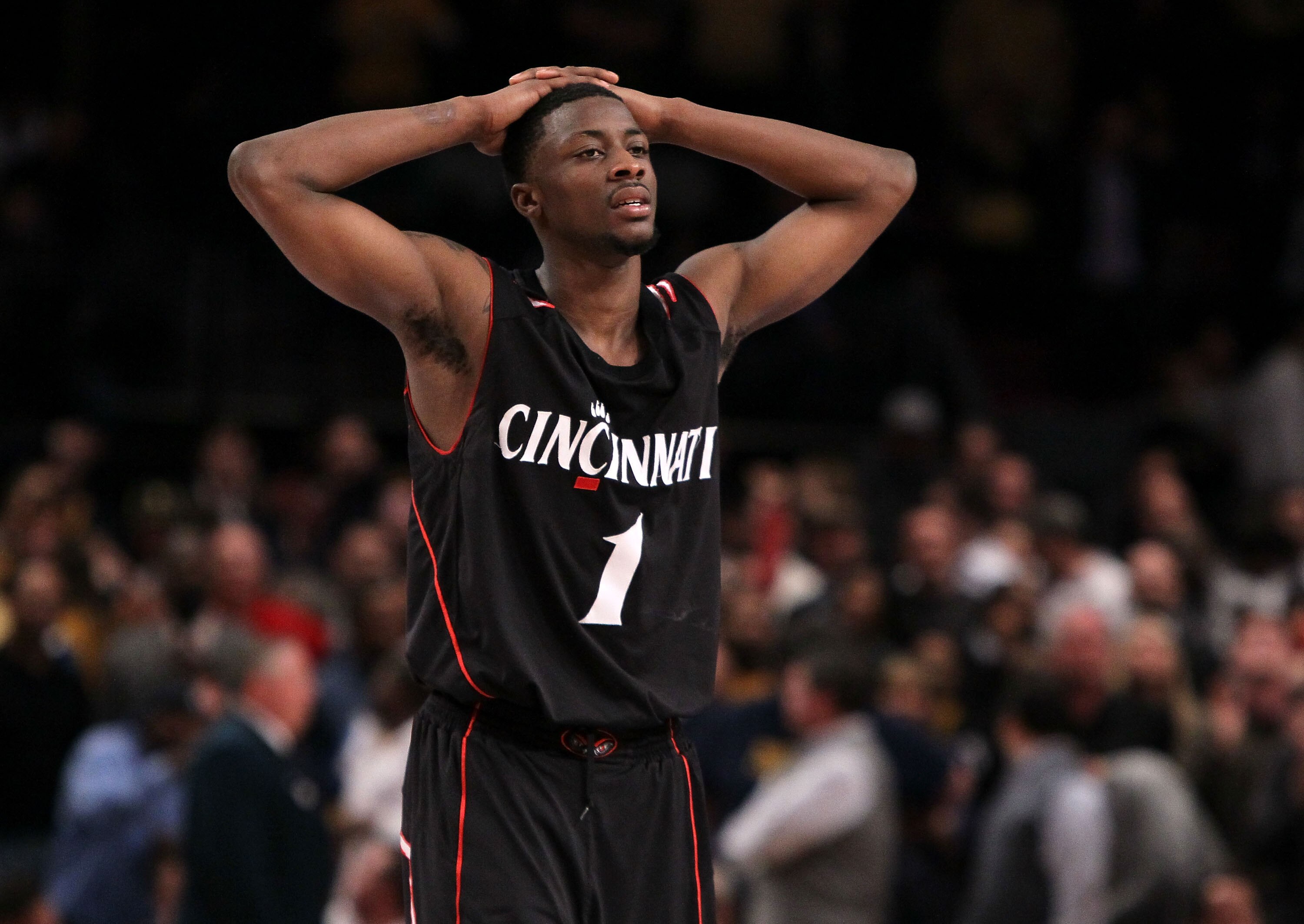NEW YORK - MARCH 11: Cashmere Wright #1 of the Cincinnati Bearcats reacts late in the game against the West Virginia Mountaineers during the quarterfinal of the 2010 NCAA Big East Tournament at Madison Square Garden on March 11, 2010 in New York City.  (P