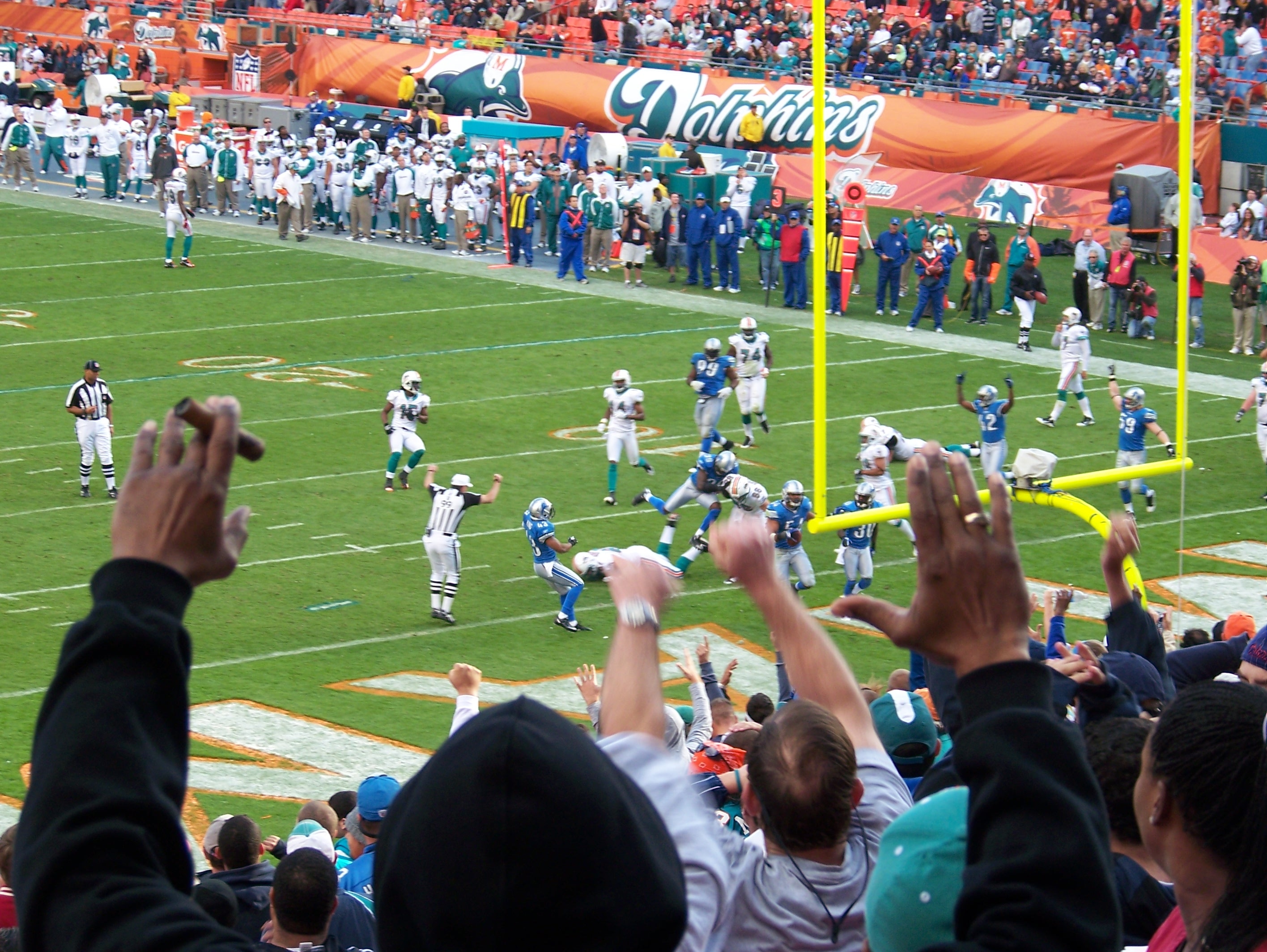 DeAndre Levy seals the deal with his 30-yard touchdown return after intercepting Miami Dolphins quarterback Chad Henne.