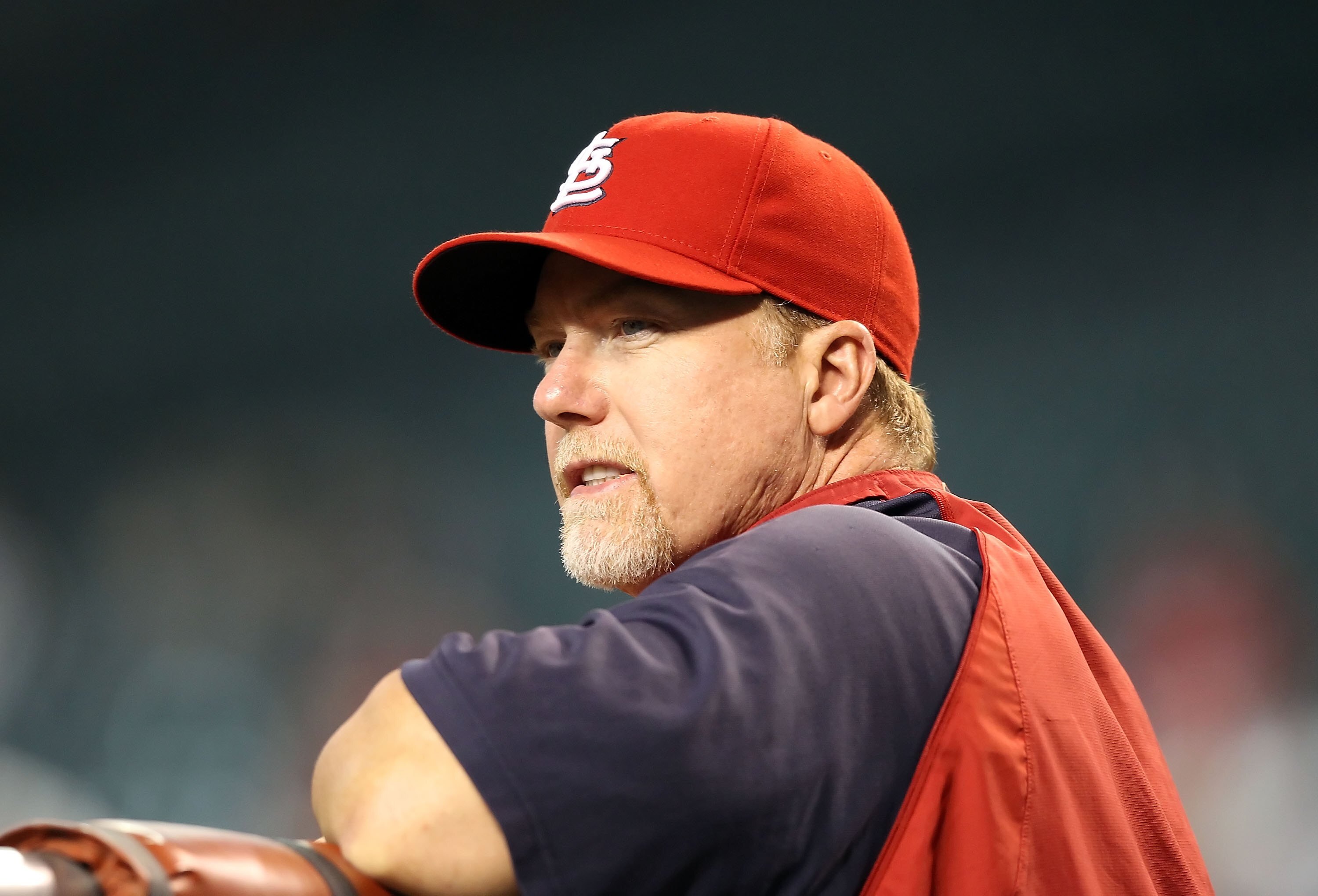 PHOENIX - JUNE 11:  Batting coach Mark McGwire #25 of the St. Louis Cardinals before the Major League Baseball game against the Arizona Diamondbacks at Chase Field on June 11, 2010 in Phoenix, Arizona. The Cardinals defeated the Diamondbacks 5-2.  (Photo