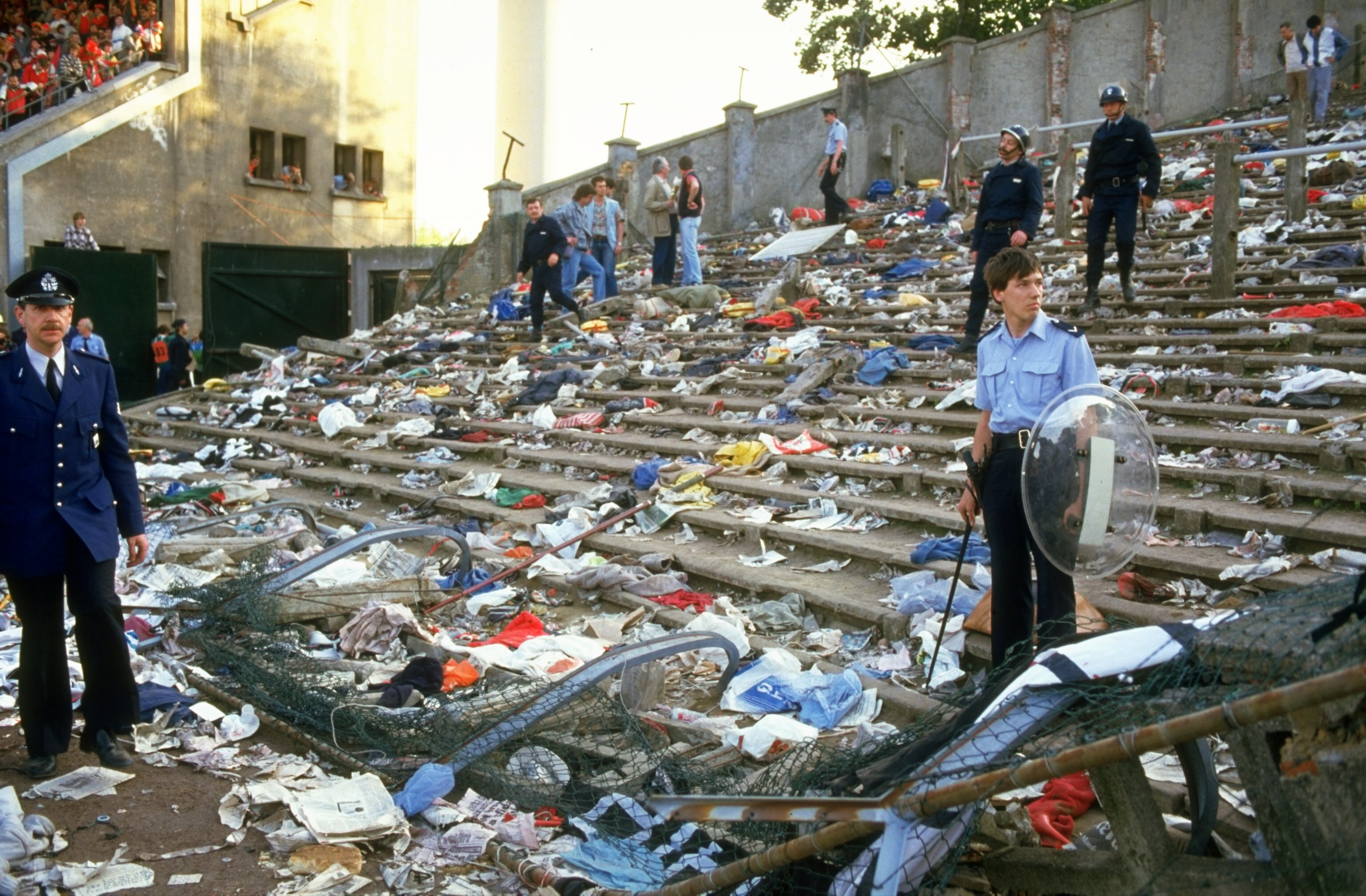 1985:  Ground staff clear the aftermath of the Heysel disaster after the European Cup Final between Liverpool and Juventus at the Heysel Stadium in Brussels, Belgium. It was the last game any English club was allowed to play in Europe for ten years. Juven