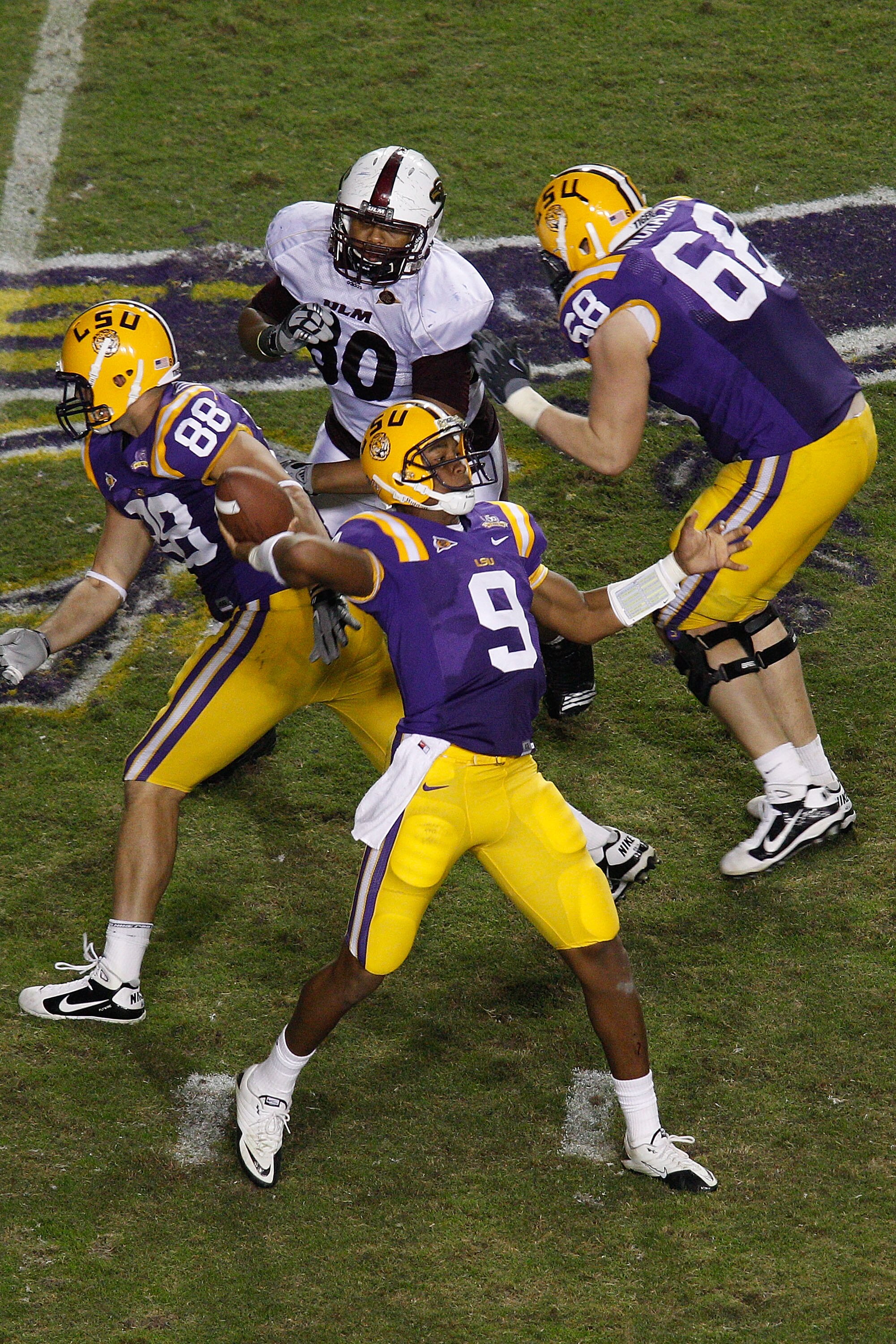 BATON ROUGE, LA - NOVEMBER 13:  Jordan Jefferson #9 of the Louisiana State University Tigers looks to throw a pass during the game against the University of Louisiana-Monroe Warhawks at Tiger Stadium on November 13, 2010 in Baton Rouge, Louisiana.   The T