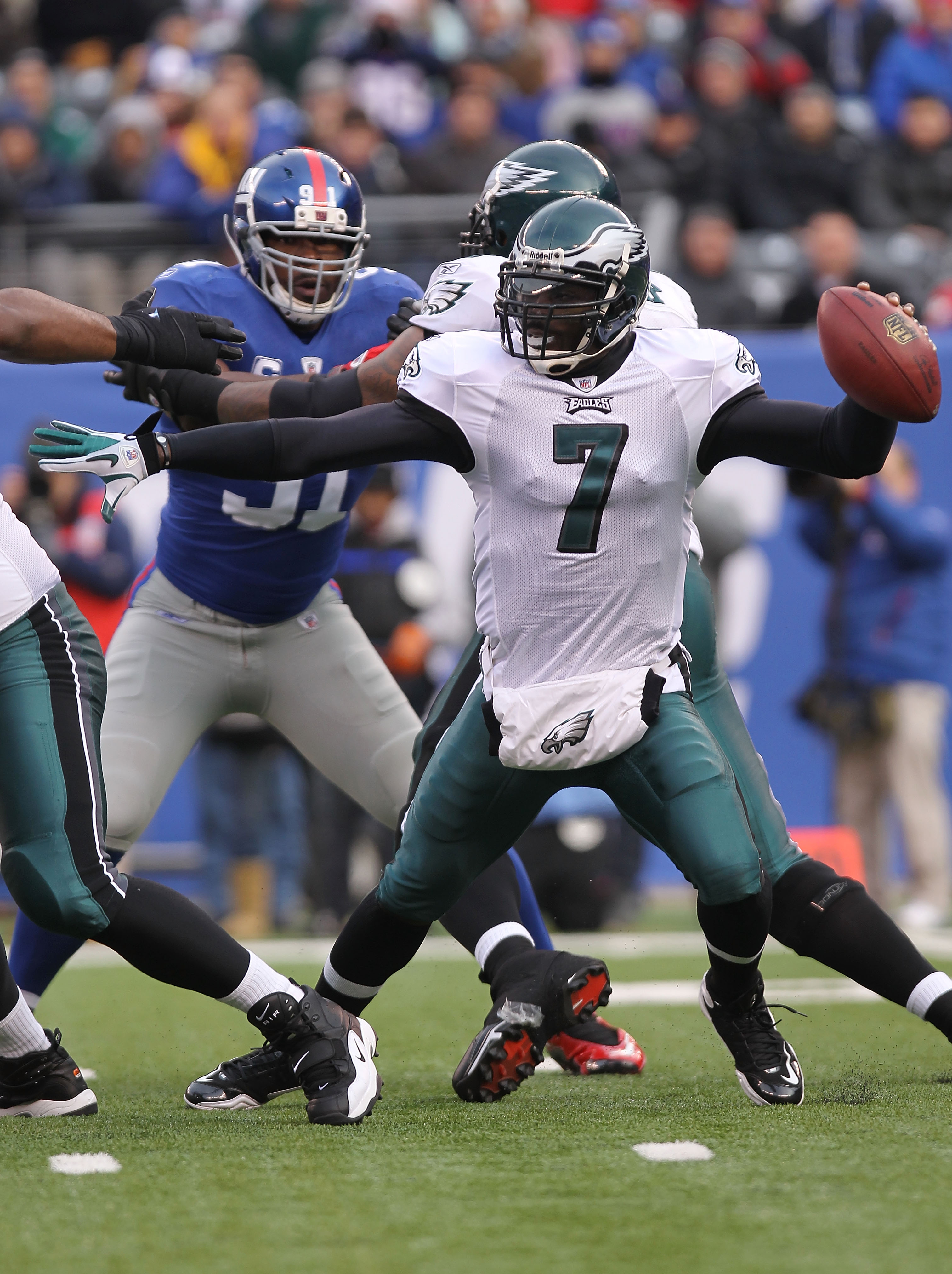 EAST RUTHERFORD, NJ - DECEMBER 19:  Michael Vick #7 of the Philadelphia Eagles against the New York Giants at New Meadowlands Stadium on December 19, 2010 in East Rutherford, New Jersey.  (Photo by Nick Laham/Getty Images)
