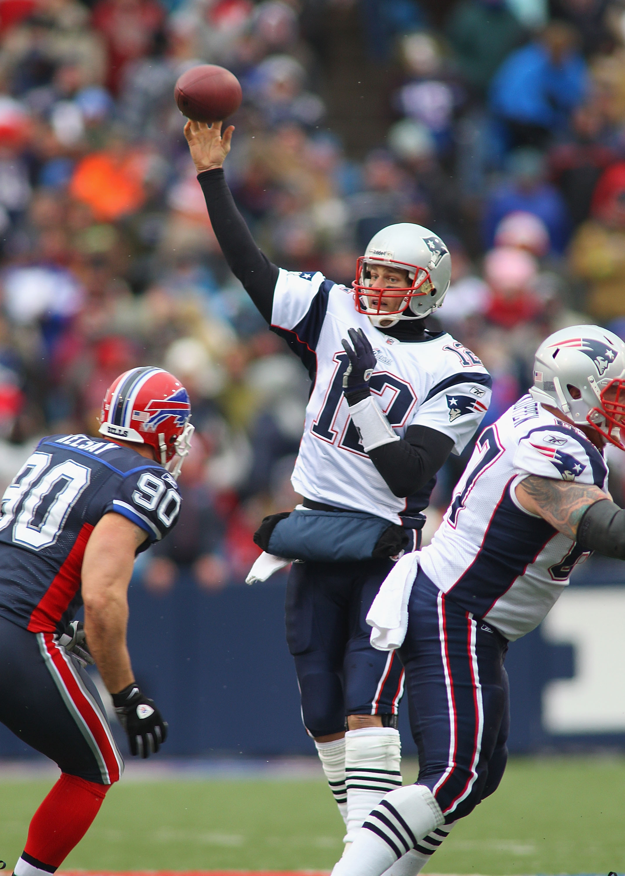 ORCHARD PARK, NY - DECEMBER 26:  Tom Brady #12 of the New England Patriots throws a pass against the Buffalo Bills at Ralph Wilson Stadium on December 26, 2010 in Orchard Park, New York.  (Photo by Rick Stewart/Getty Images)