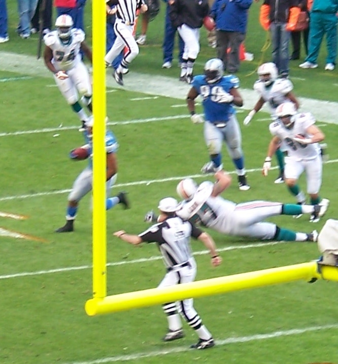 DeAndre Levy on the run after intercepting Chad Henne late in the fourth quarter.