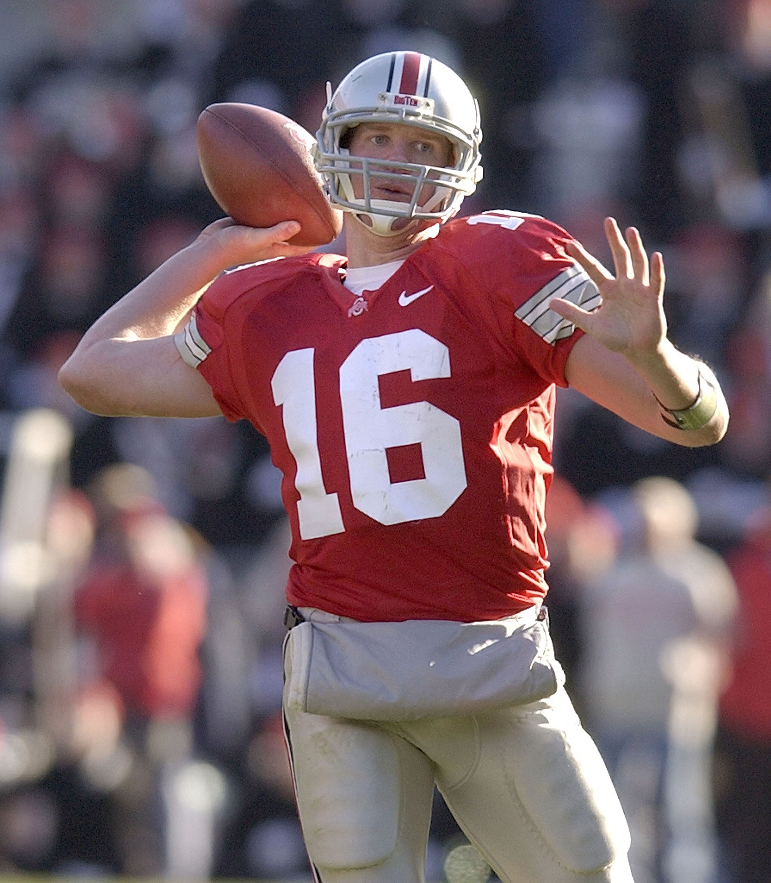 COLUMBUS, OH - NOVEMBER 8:  Quarterback Craig Krenzel #16 of the Ohio State Buckeyes throws a pass against the Michigan State Spartans during the third quarter on November 8, 2003 at Ohio Stadium in Columbus, Ohio. Ohio State defeated Michigan State 33-23