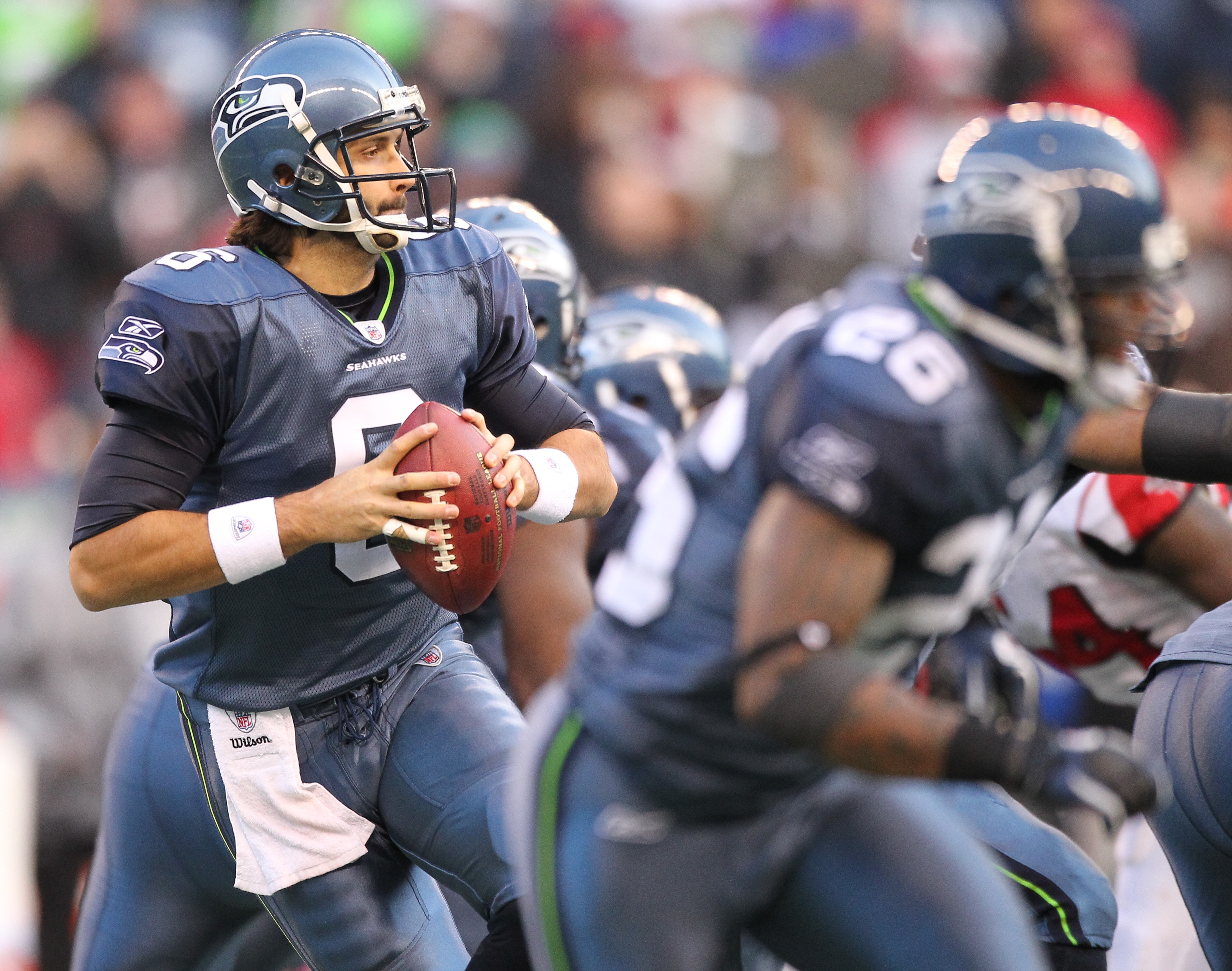 SEATTLE, WA - DECEMBER 19:  Quarterback Charlie Whitehurst #6 of the Seattle Seahawks looks to pass against the Atlanta Falcons at Qwest Field on December 19, 2010 in Seattle, Washington. (Photo by Otto Greule Jr/Getty Images)