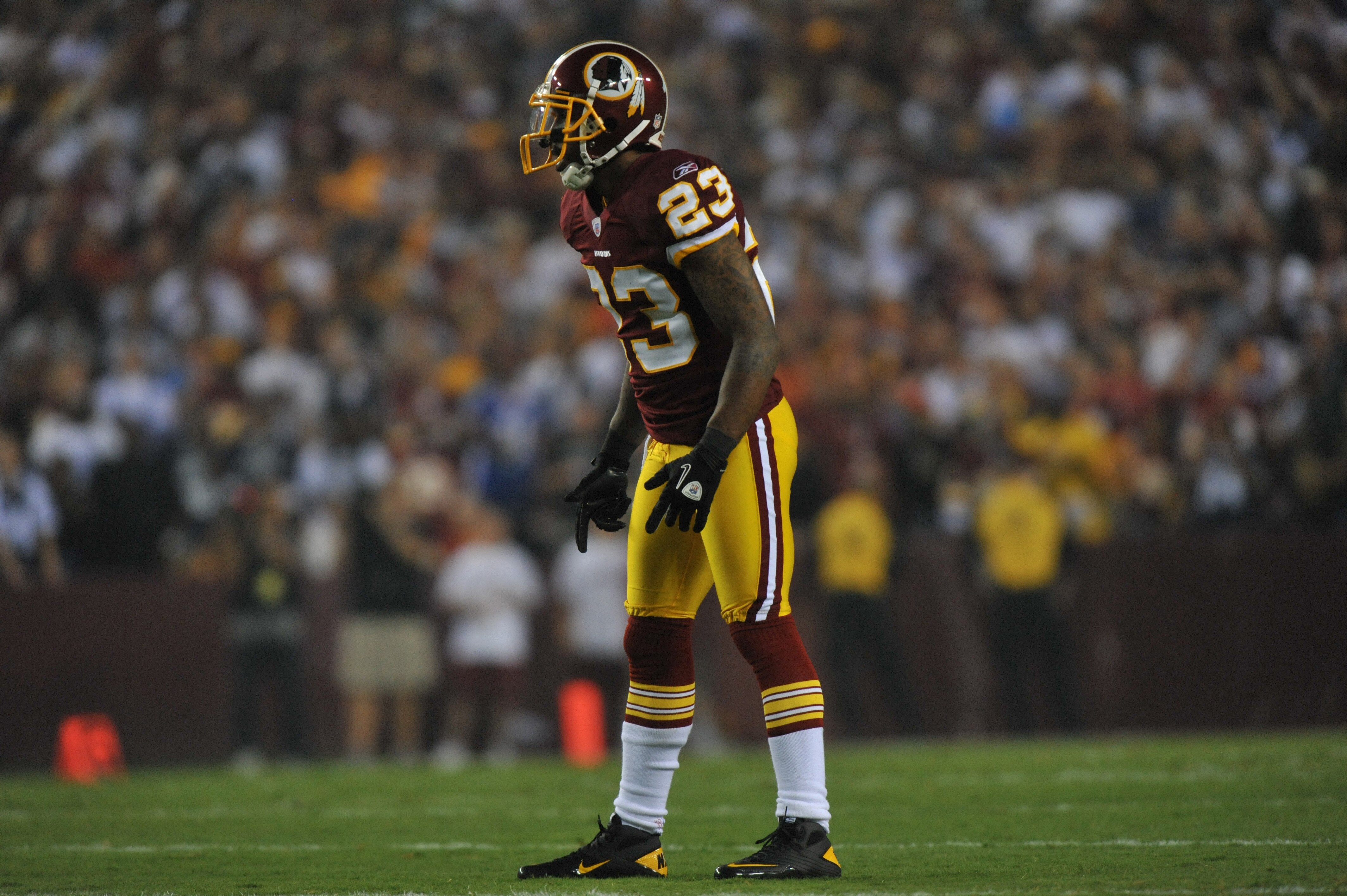LANDOVER - SEPTEMBER 12:  DeAngelo Hall #23 of the Washington Redskins defends during the NFL season opener against the Dallas Cowboys at FedExField on September 12, 2010 in Landover, Maryland. The Redskins defeated the Cowboys 13-7. (Photo by Larry Frenc