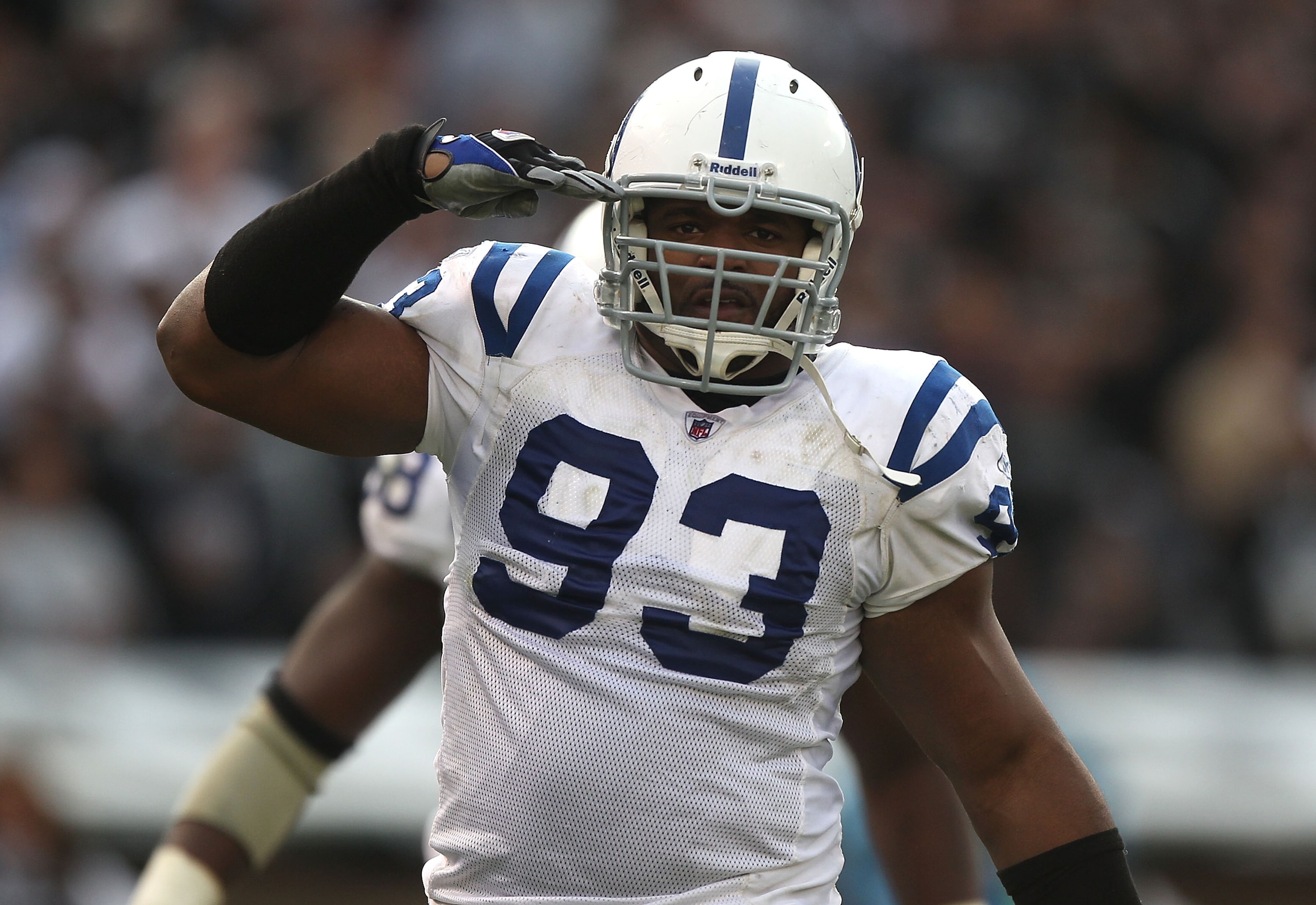 OAKLAND, CA - DECEMBER 26:  Dwight Freeney #93 of the Indianapolis Colts celebrates after a sack against the Oakland Raiders during an NFL game at Oakland-Alameda County Coliseum on December  26, 2010 in Oakland, California.  (Photo by Jed Jacobsohn/Getty