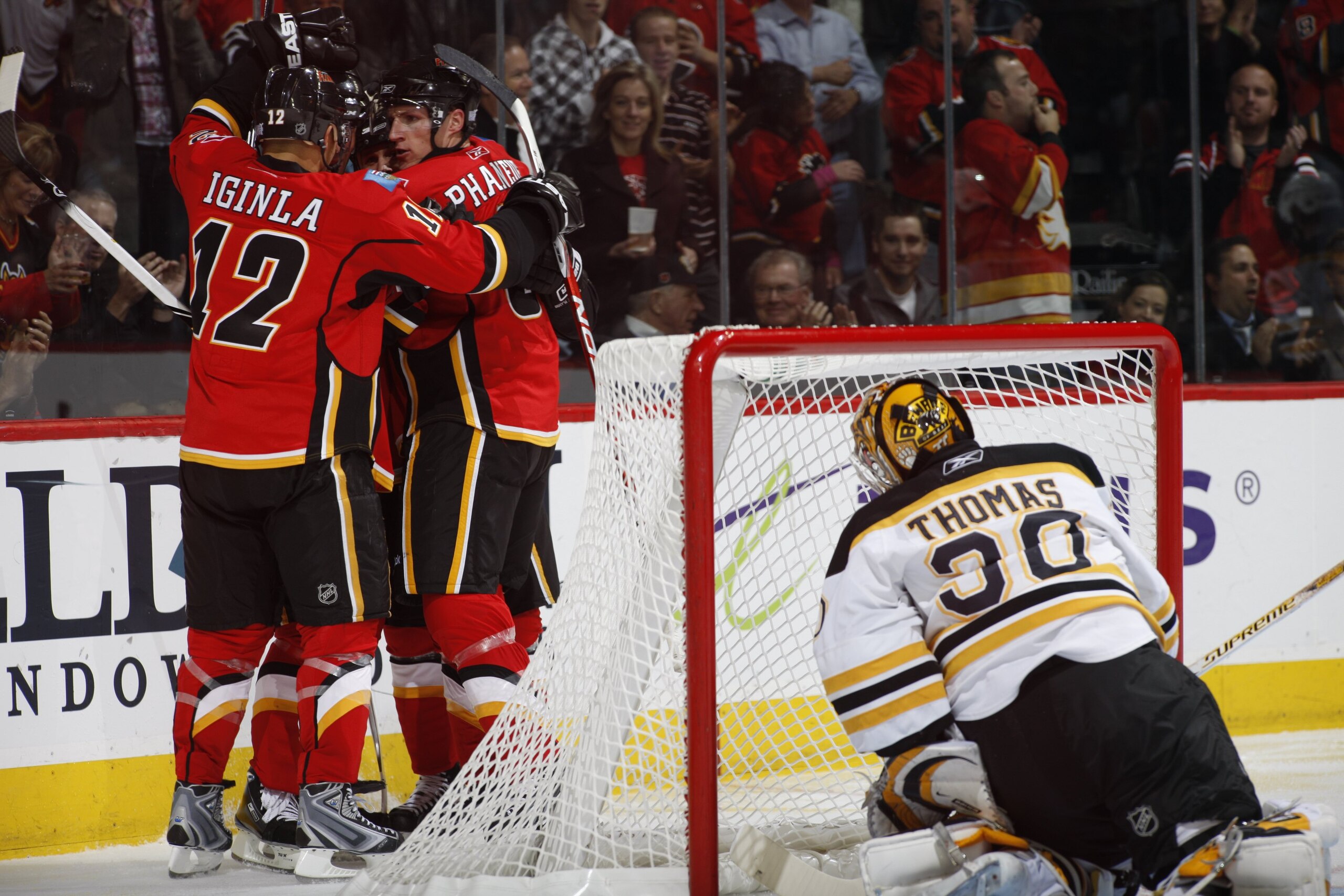 CALGARY, AB - OCTOBER 30:  Jarome Iginla #12 of the Calgary Flames celebrates with teammates during the game against the Boston Bruins on October 30, 2008 at the Pengrowth Saddledome in Calgary, Alberta, Canada.  (Photo by Dale MacMillan/Getty Images)