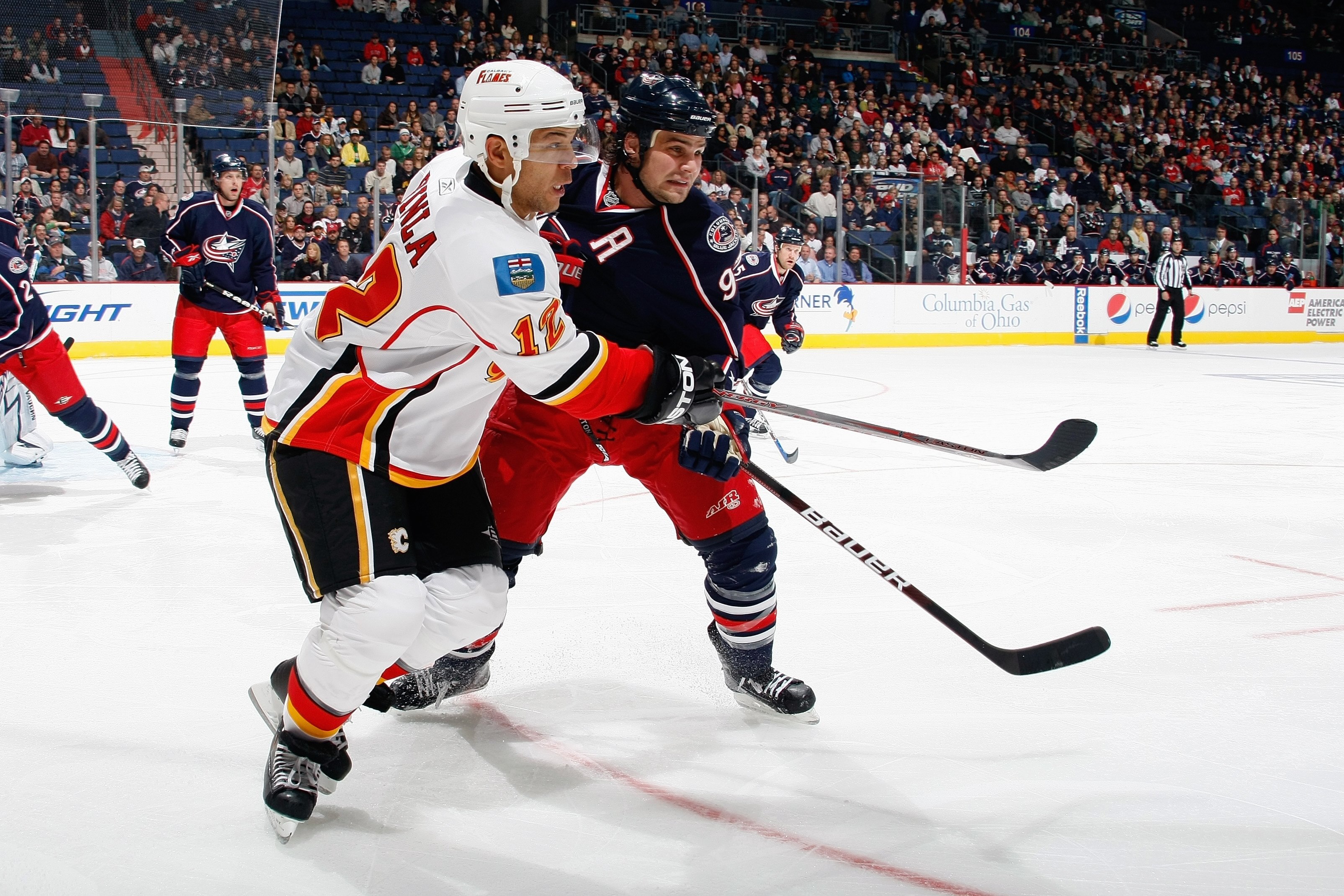 COLUMBUS, OH - OCTOBER 13:  Jarome Iginla #12 of the Calgary Flames skates against Rostislav Klesla #97 of the Columbus Blue Jackets during the game on October 13, 2009 at Nationwide Arena in Columbus, Ohio. (Photo by Gregory Shamus/Getty Images)