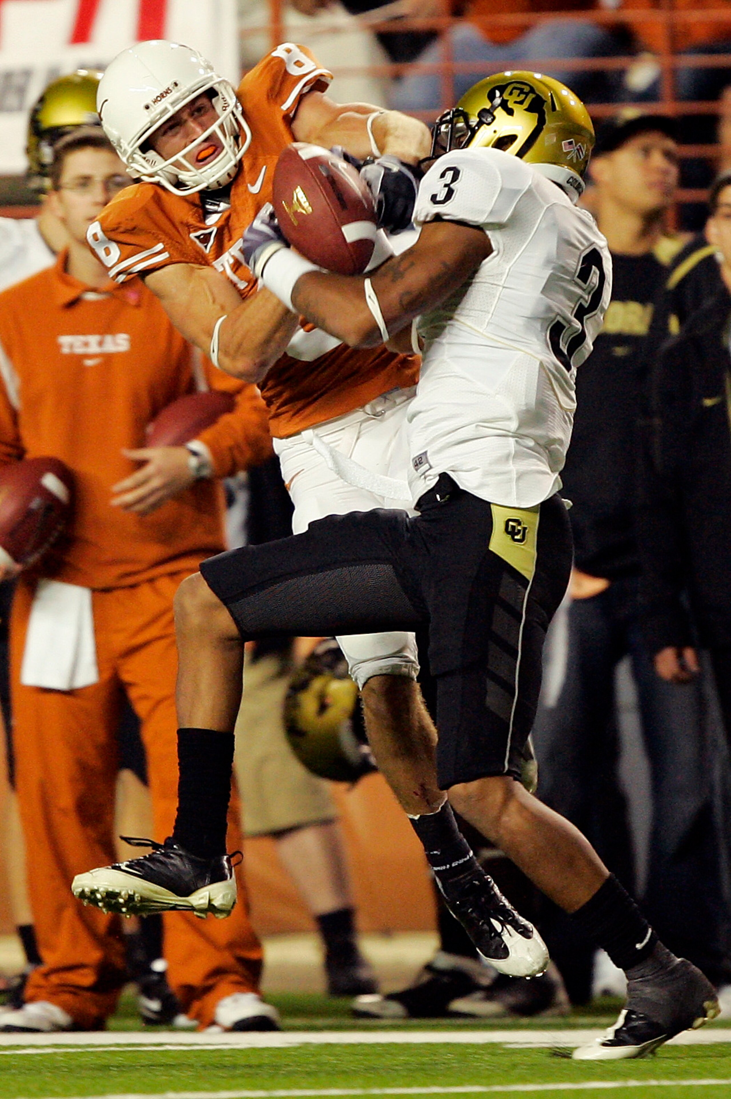 AUSTIN, TX - OCTOBER 10: Jordan Shipley #8 of the Texas Longhorns wrestles for control of the ball with cornerback Jimmy Smith #3 of the Colorado Buffaloes for an incomplete pass on October 10, 2009 at Darrell K Royal-Texas Memorial Stadium in Austin, Tex