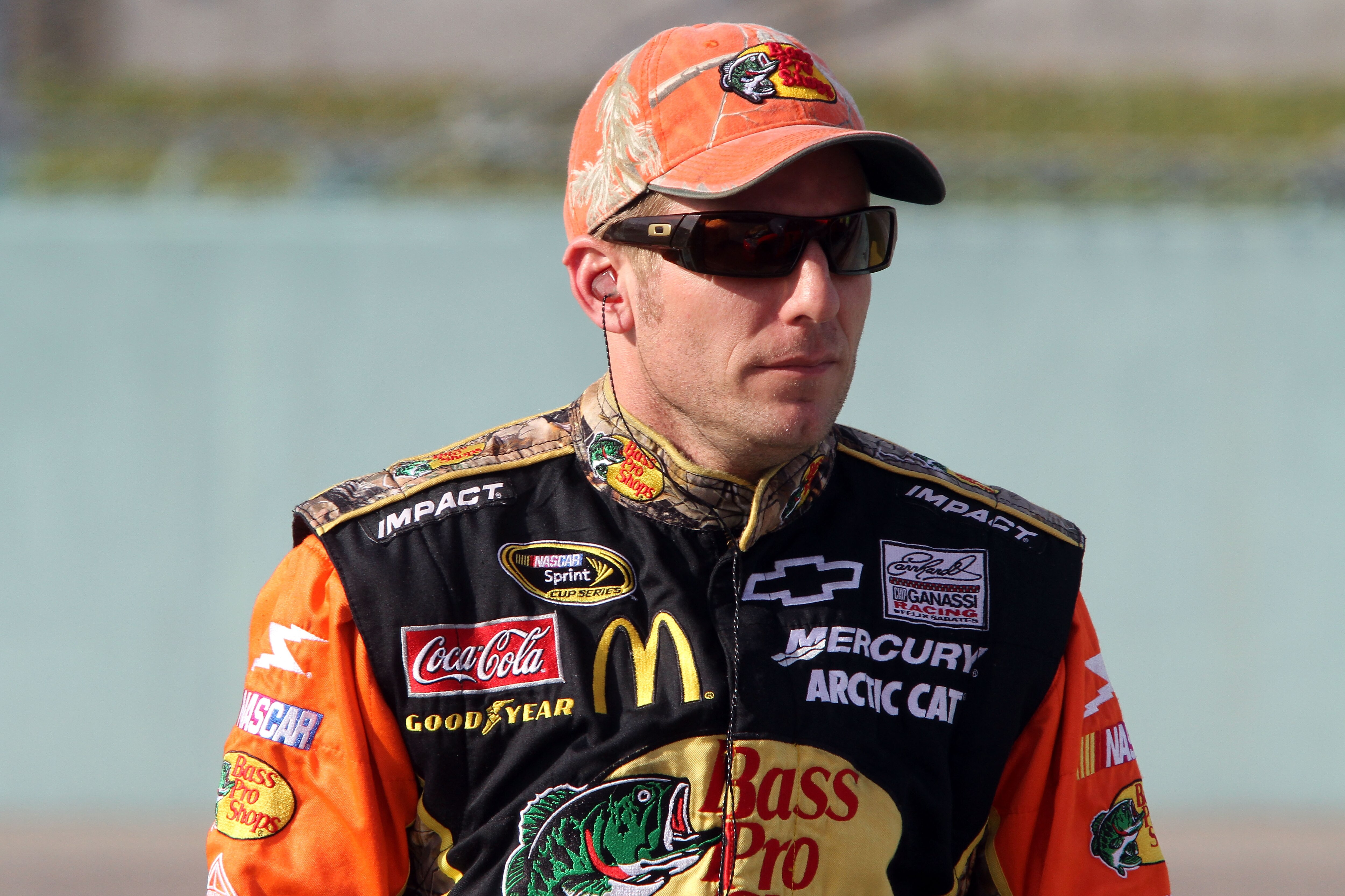 HOMESTEAD, FL - NOVEMBER 19:  Jamie McMurray, driver of the #1 Bass Pro Shops Chevrolet, sits on pit wall during qualifying for the NASCAR Sprint Cup Series Ford 400 at Homestead-Miami Speedway on November 19, 2010 in Homestead, Florida.  (Photo by Jerry 
