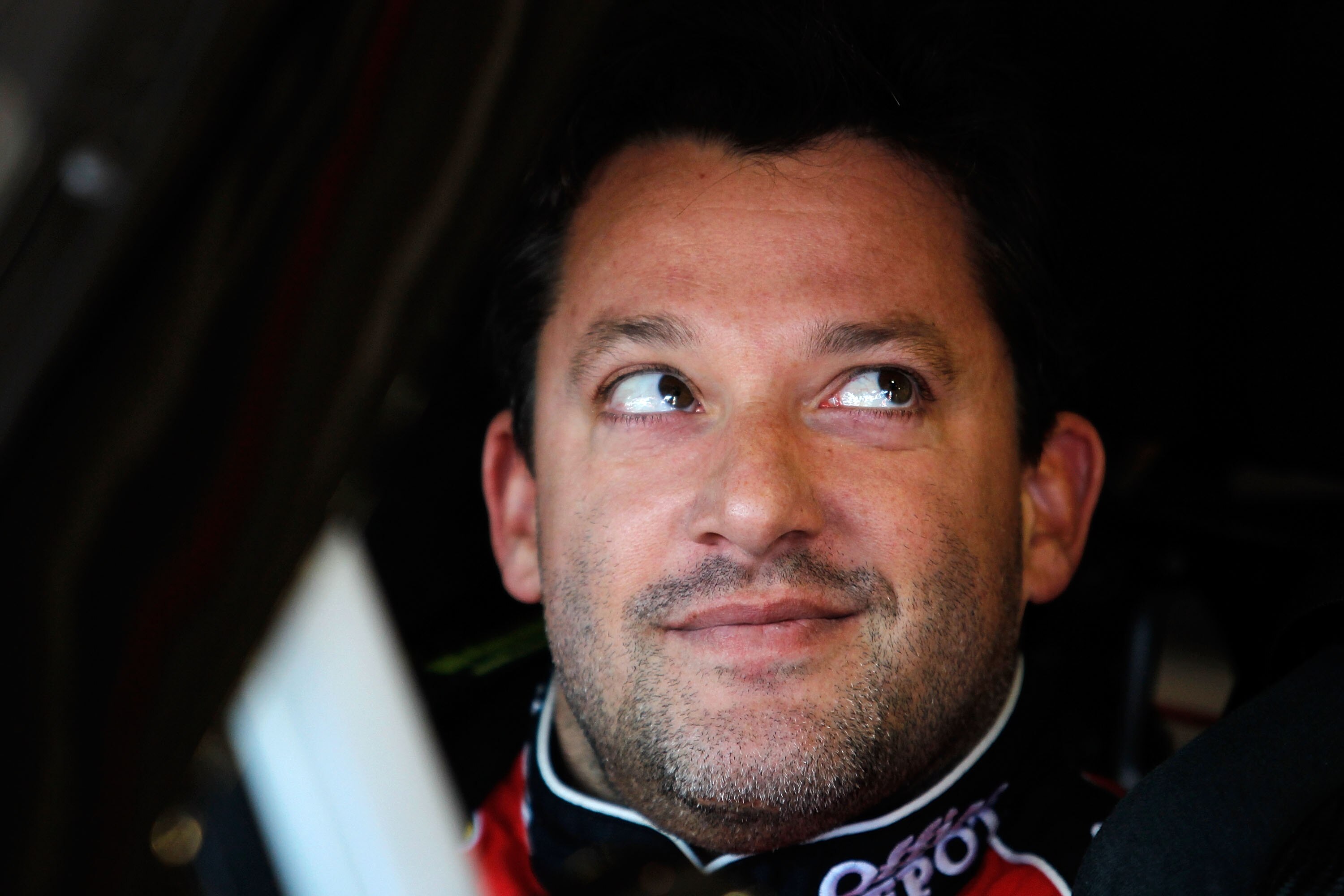 FONTANA, CA - OCTOBER 08:  Tony Stewart, driver of the #14 Office Depot Chevrolet, sits in his car during practice for the NASCAR Sprint Cup Series Pepsi Max 400 on October 8, 2010 in Fontana, California.  (Photo by Todd Warshaw/Getty Images)