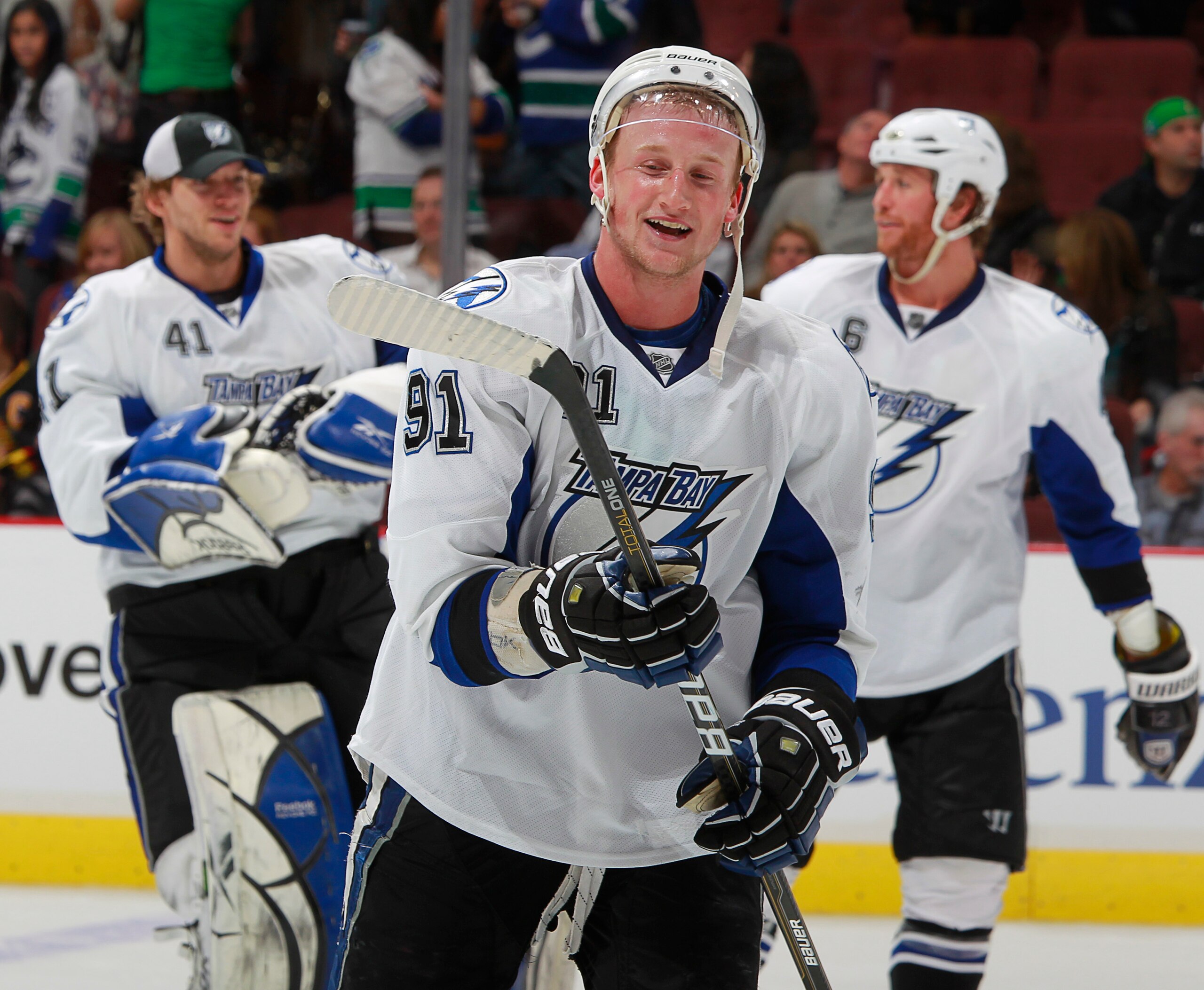 VANCOUVER, CANADA - DECEMBER 11:  Steven Stamkos #91 of the Tampa Bay Lighting smiles after scoring the overtime winning goal during their game against the Vancouver Canucks at Rogers Arena on December 11, 2010 in Vancouver, British Columbia, Canada.  Tam