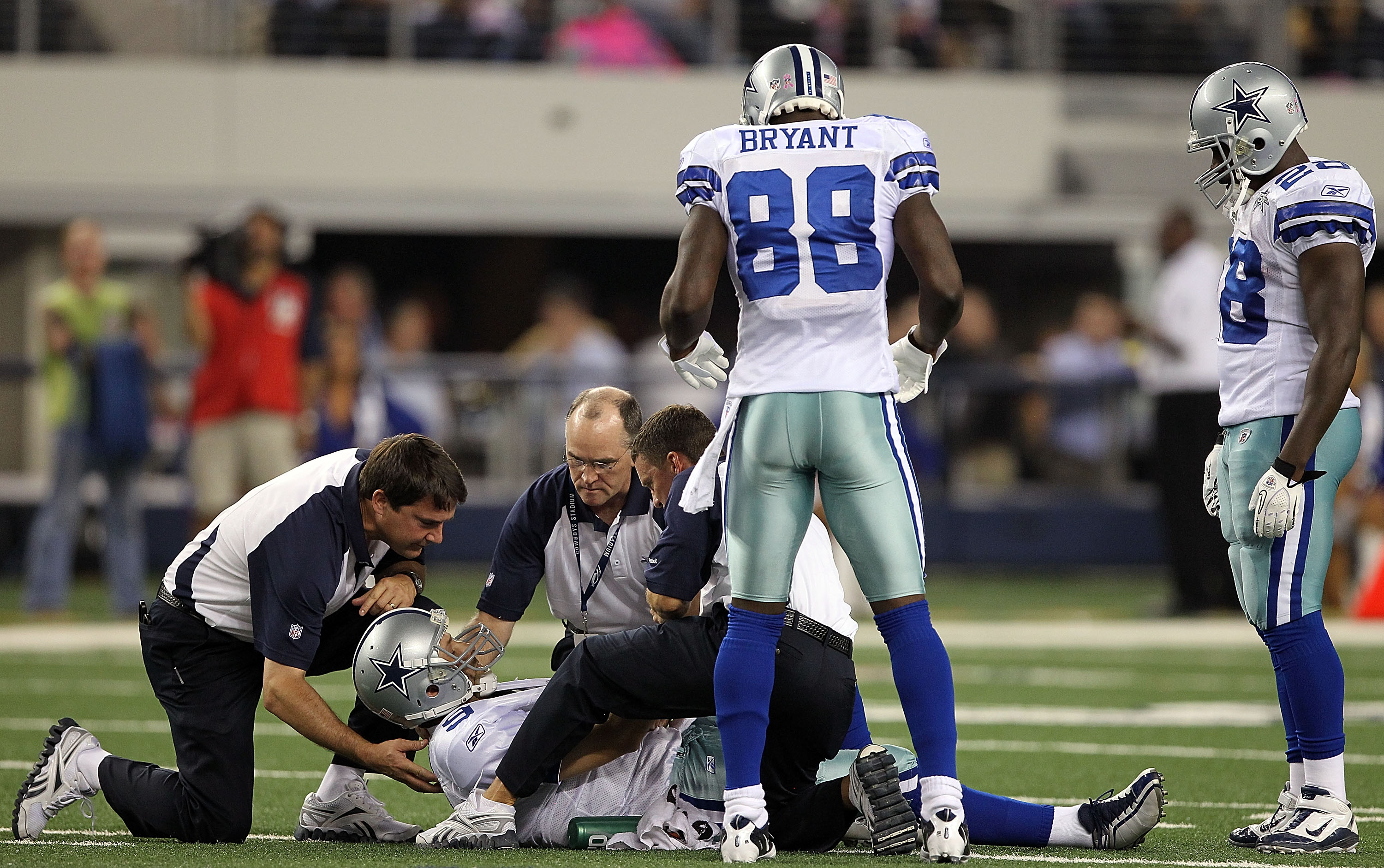 ARLINGTON, TX - OCTOBER 25:  Quarterback Tony Romo #9 of the Dallas Cowboys lies on the field after a left shoulder injury in the second quarter against the New York Giants at Cowboys Stadium on October 25, 2010 in Arlington, Texas.  (Photo by Ronald Mart