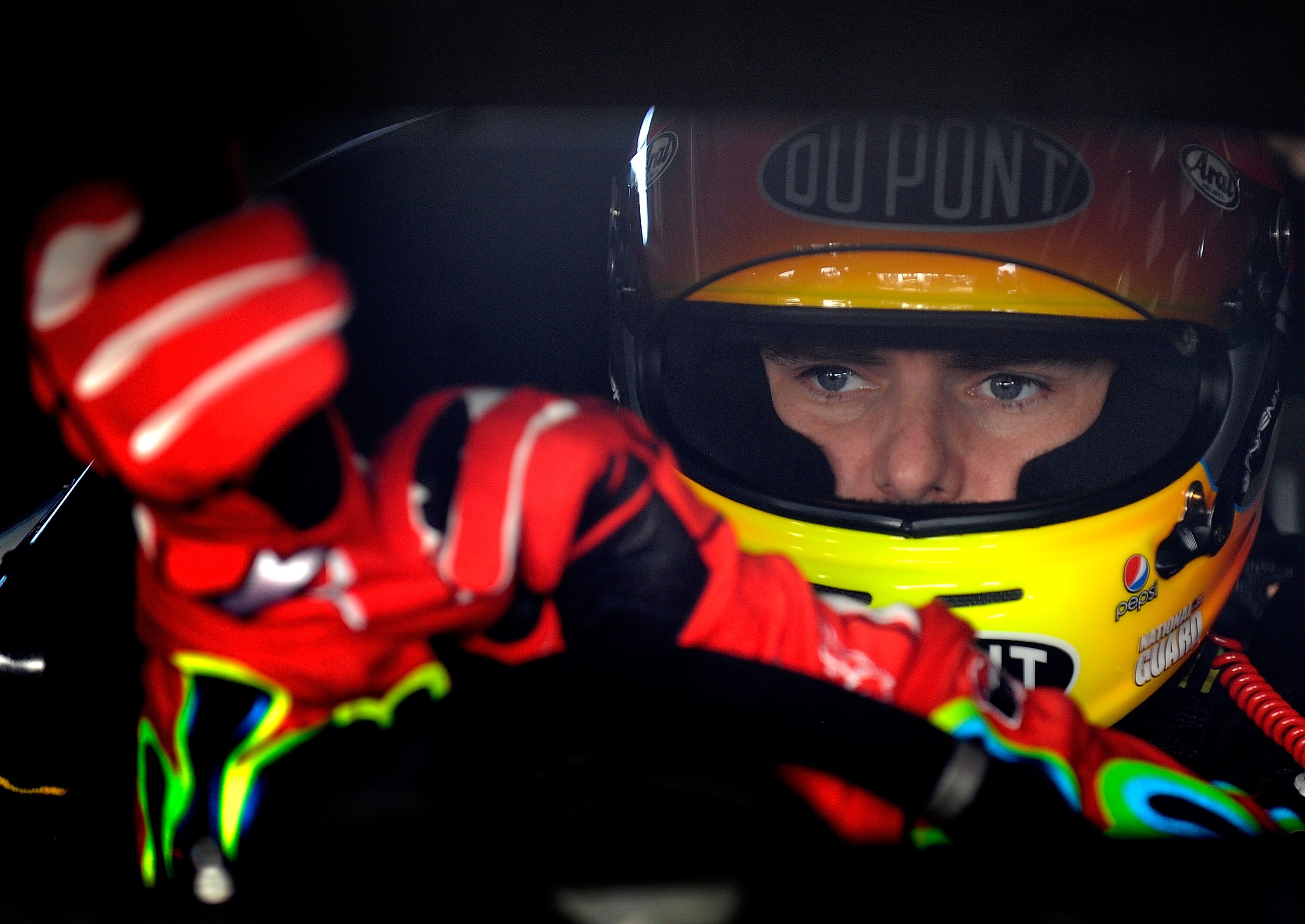 HOMESTEAD, FL - NOVEMBER 19:  Jeff Gordon, driver of the #24 DuPont Chevrolet, sits in his car during practice for the NASCAR Sprint Cup Series Ford 400 at Homestead-Miami Speedway on November 19, 2010 in Homestead, Florida.  (Photo by Rusty Jarrett/Getty