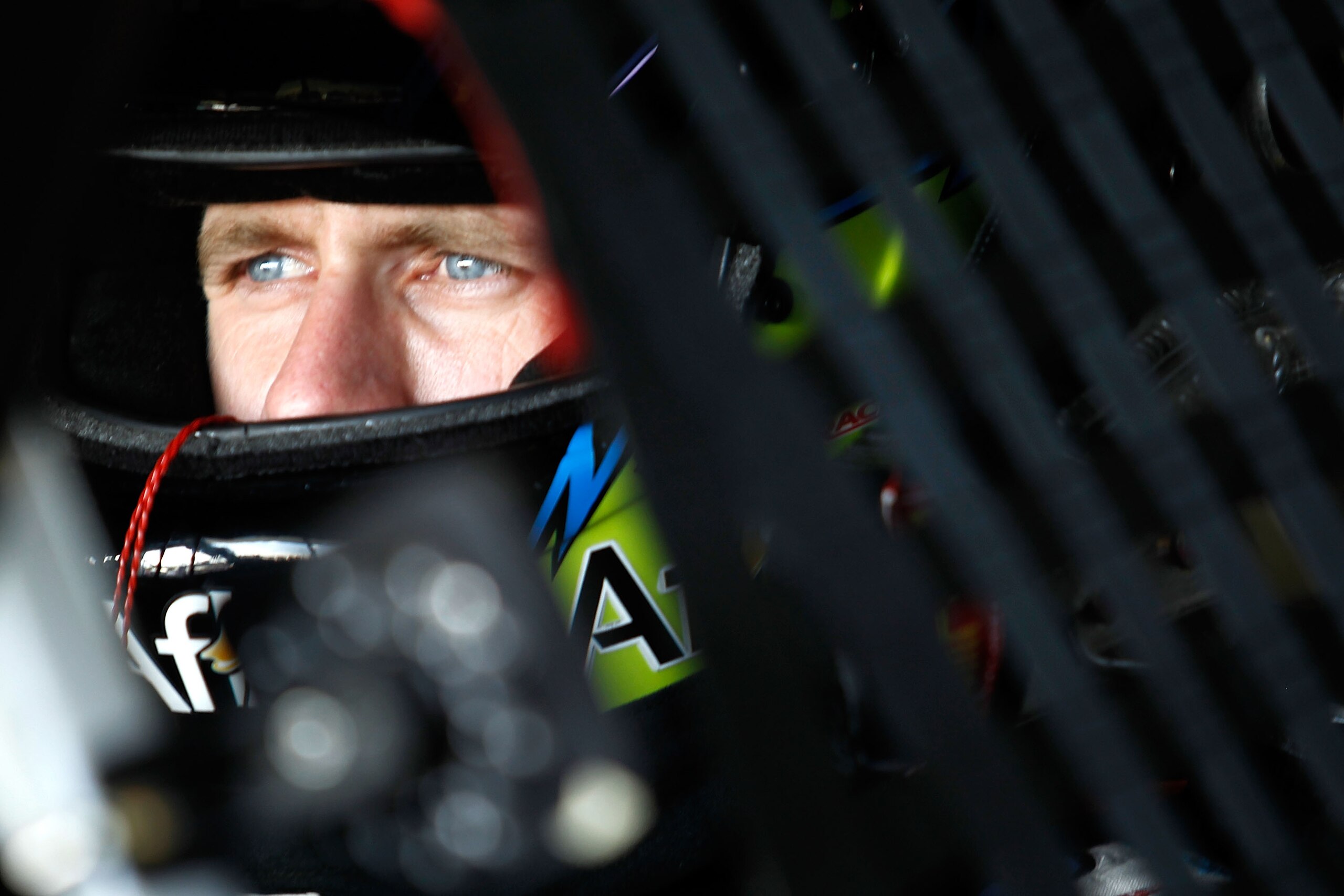HOMESTEAD, FL - NOVEMBER 20:  Carl Edwards, driver of the #99 Aflac Ford, sits in his car during practice for the NASCAR Sprint Cup Series Ford 400 at Homestead-Miami Speedway on November 20, 2010 in Homestead, Florida.  (Photo by Todd Warshaw/Getty Image