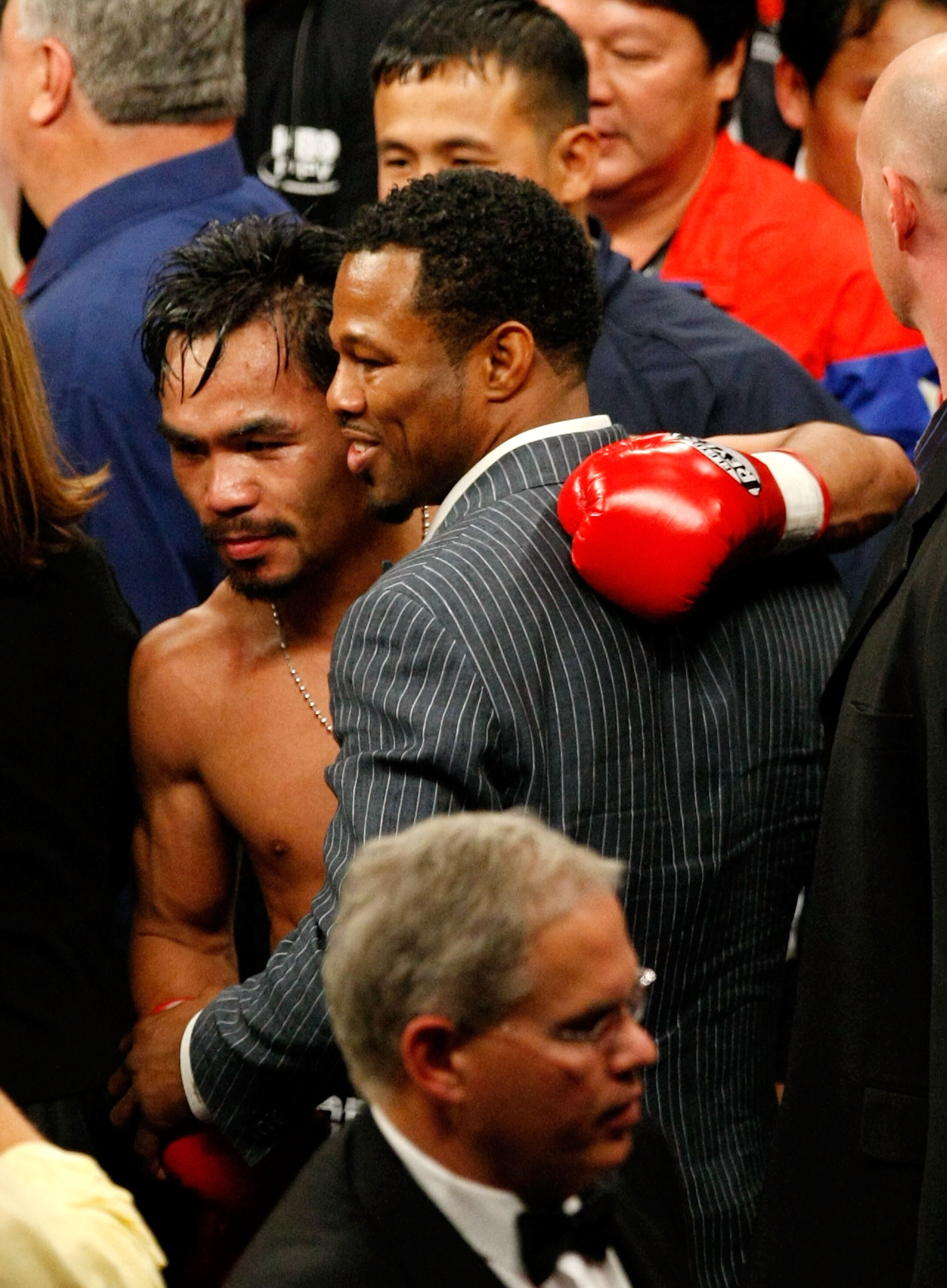 LAS VEGAS - DECEMBER 06:  (L-R) Manny Pacquiao of the Philippines celebrates with Shane Mosley after defeating Oscar De La Hoya in their welterweight fight at the MGM Grand Garden Arena December 6, 2008 in Las Vegas, Nevada.  (Photo by Ethan Miller/Getty