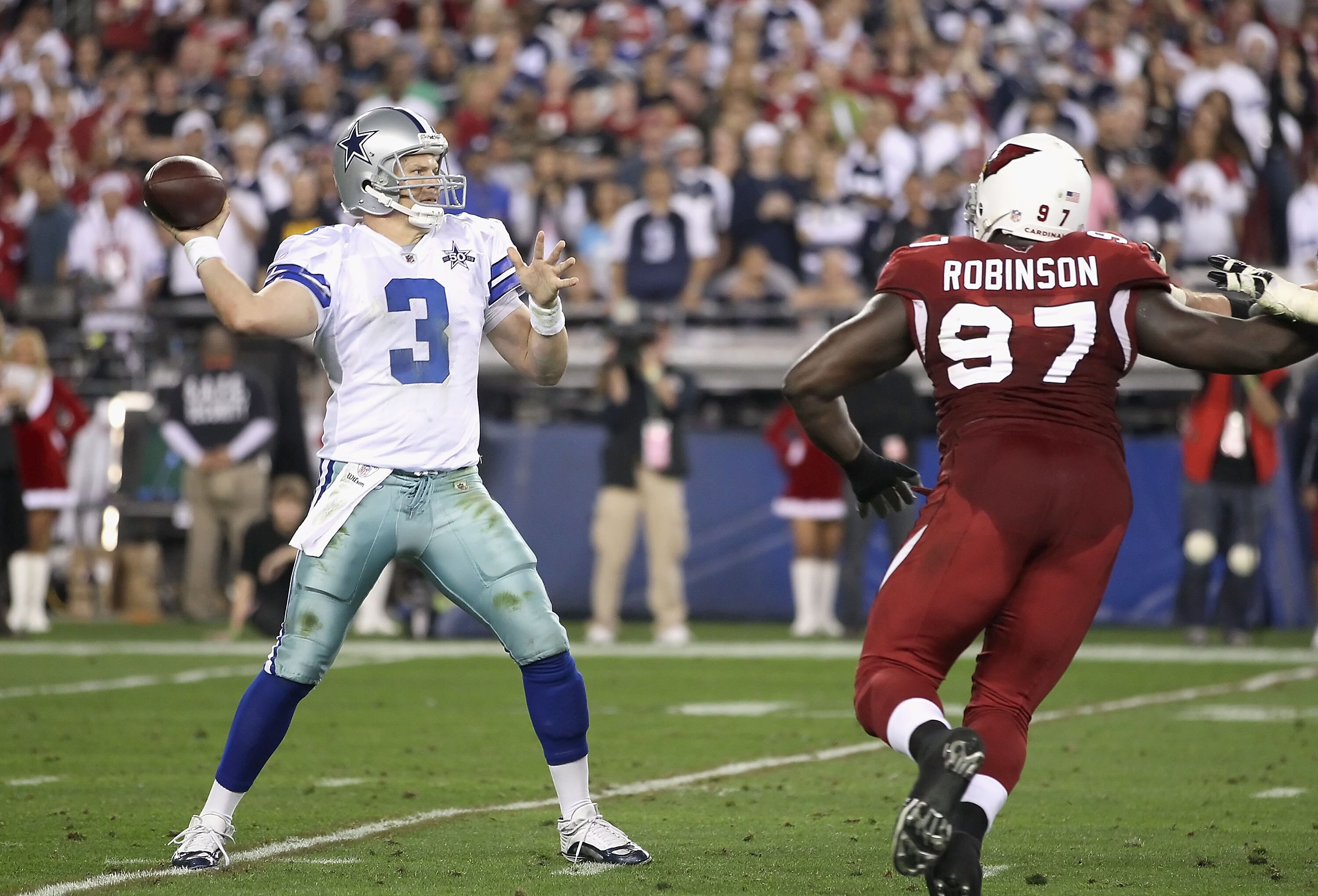 GLENDALE, AZ - DECEMBER 25:  Quarterback Jon Kitna #3 of the Dallas Cowboys throws a pass during the NFL game against the Arizona Cardinals at the University of Phoenix Stadium on December 25, 2010 in Glendale, Arizona. The Cardinals defeated the Cowboys