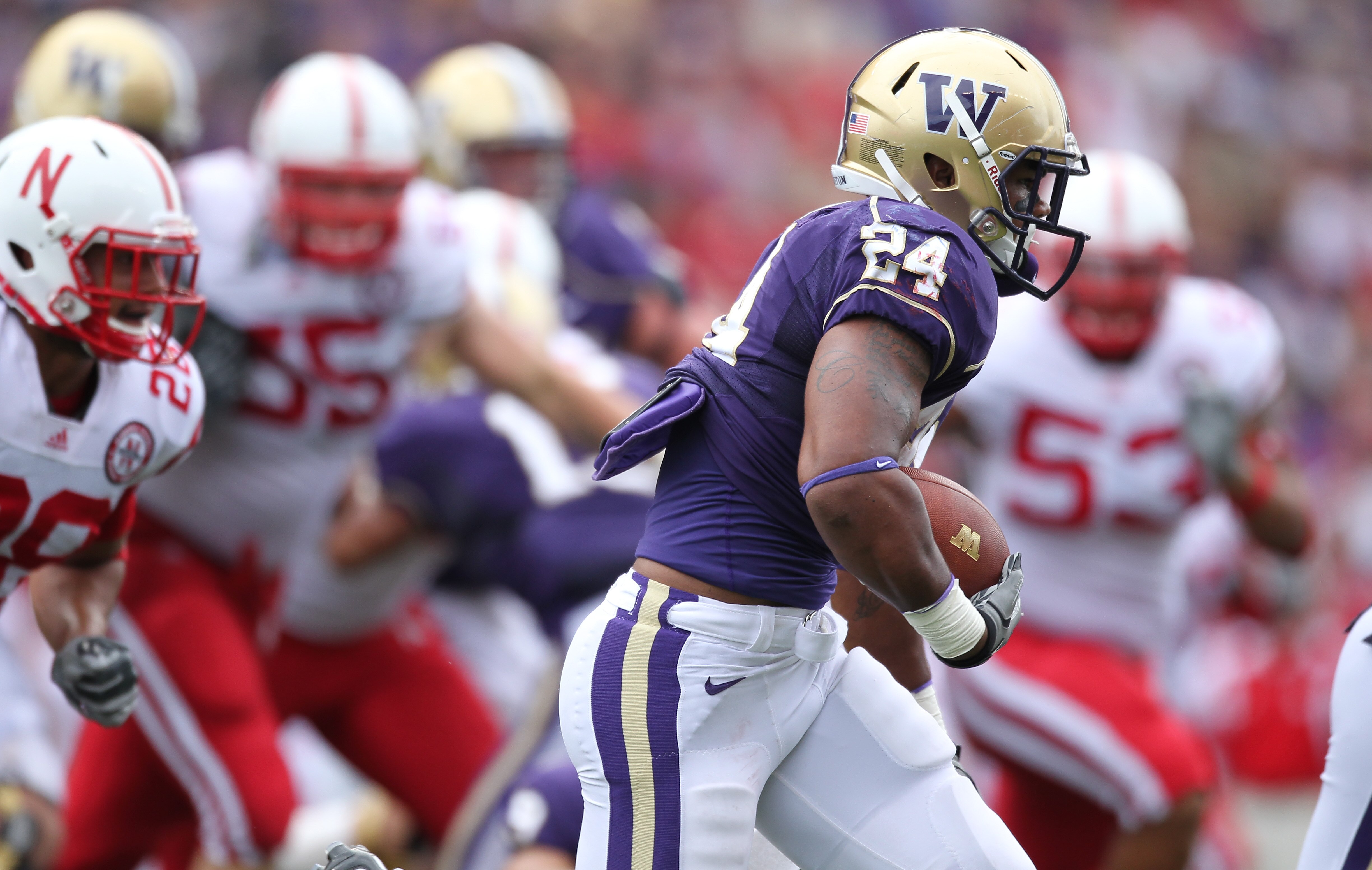 SEATTLE - SEPTEMBER 18: Running back Jesse Callier #24 of the Washington Huskies rushes against the Nebraska Cornhuskers on September 18, 2010 at Husky Stadium in Seattle, Washington. (Photo by Otto Greule Jr/Getty Images)