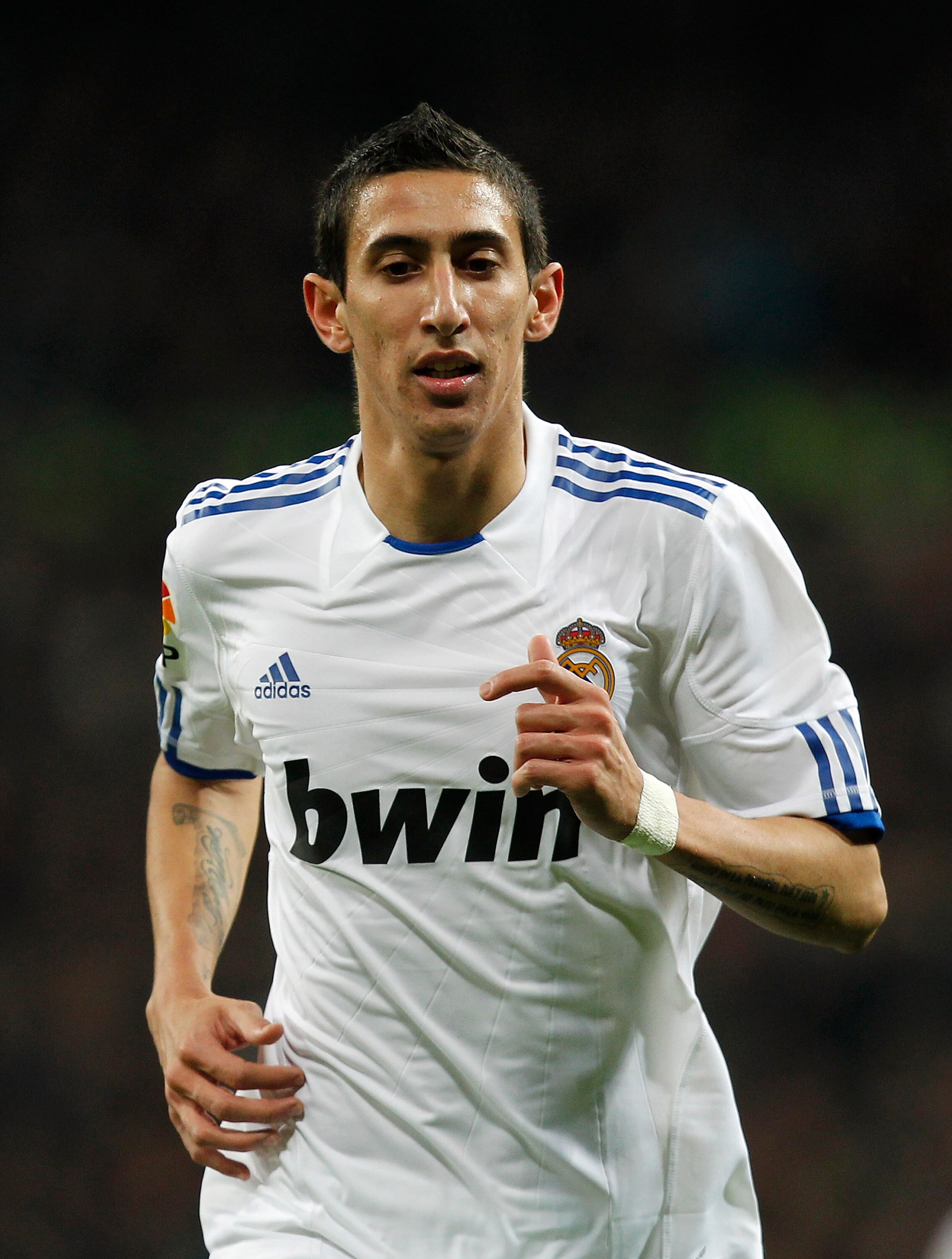 MADRID, SPAIN - DECEMBER 19:  Angel di Maria of Real Madrid looks on during the La Liga match between Real Madrid and Sevilla at Estadio Santiago Bernabeu on December 19, 2010 in Madrid, Spain. Real Madrid won the match 1-0.  (Photo by Angel Martinez/Gett