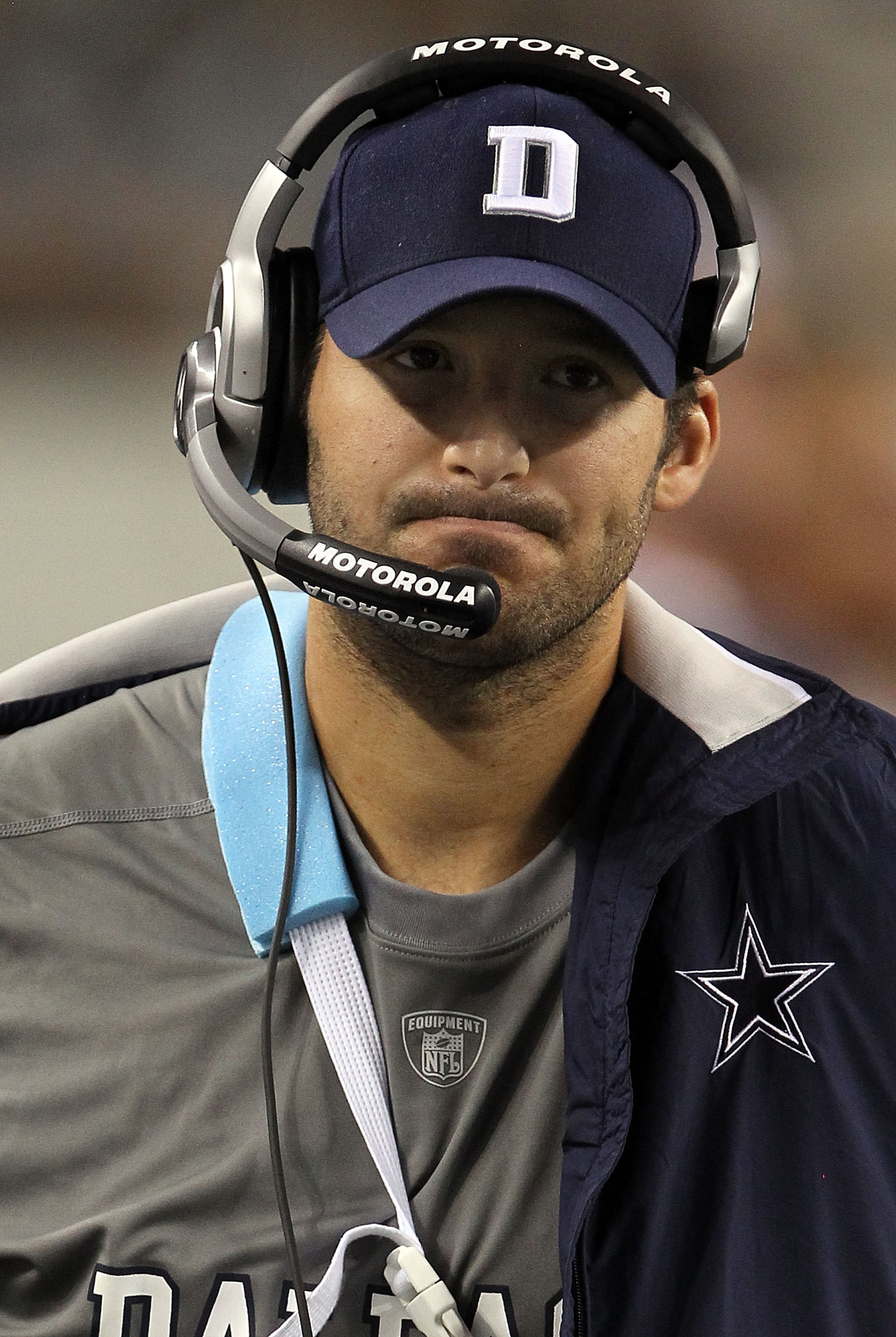 ARLINGTON, TX - OCTOBER 25:  Quarterback Tony Romo #9 of the Dallas Cowboys wears a sling on the sidelines after a left shoulder injury against the New York Giants at Cowboys Stadium on October 25, 2010 in Arlington, Texas.  (Photo by Ronald Martinez/Gett