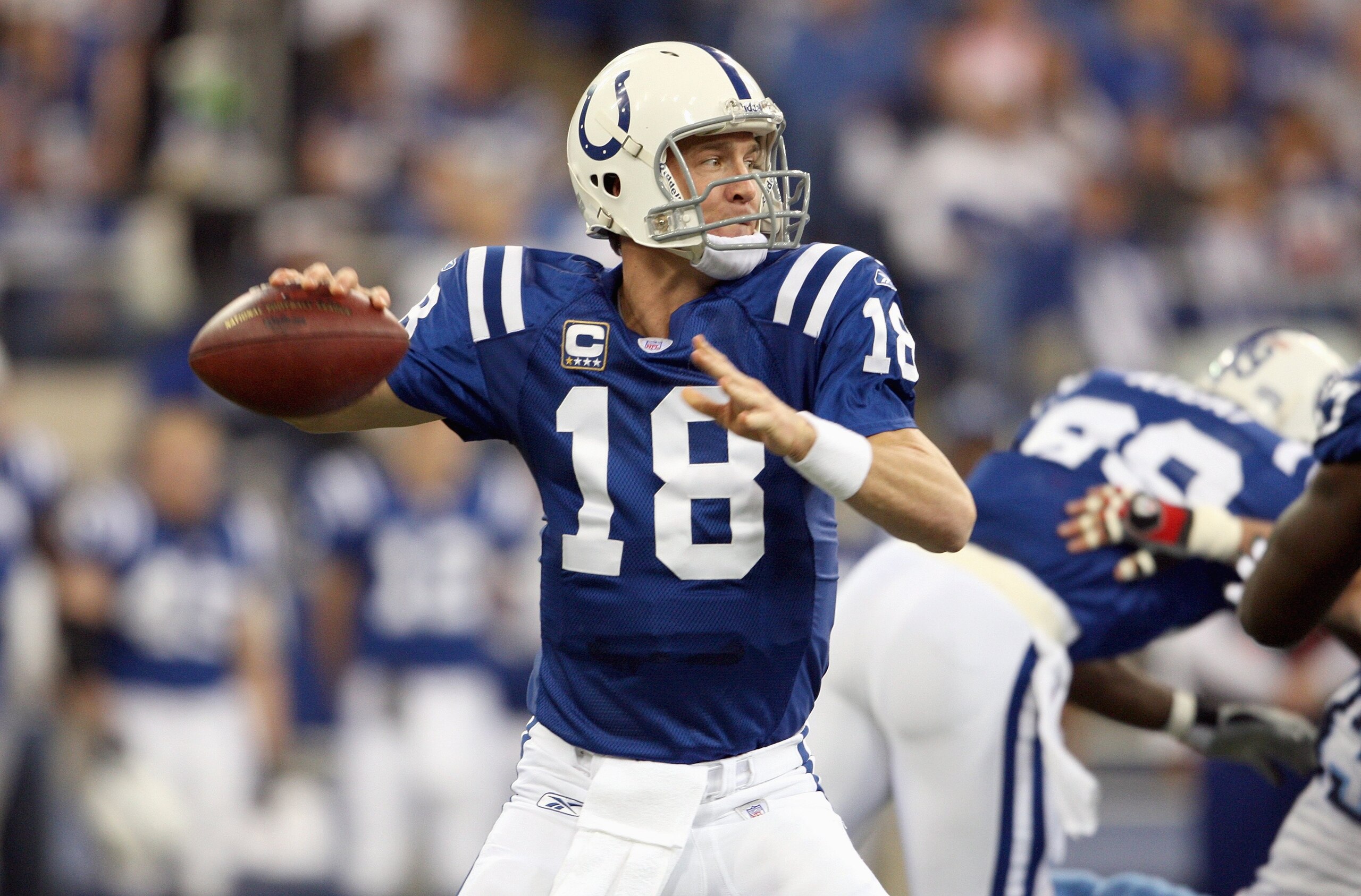 INDIANAPOLIS - DECEMBER 30: Peyton Manning #18 of the Indianapolis Colts passes the ball during the NFL game against the Tennessee Titans on December 30, 2007 at the RCA Dome in Indianapolis, Indiana. (Photo by Andy Lyons/Getty Images)