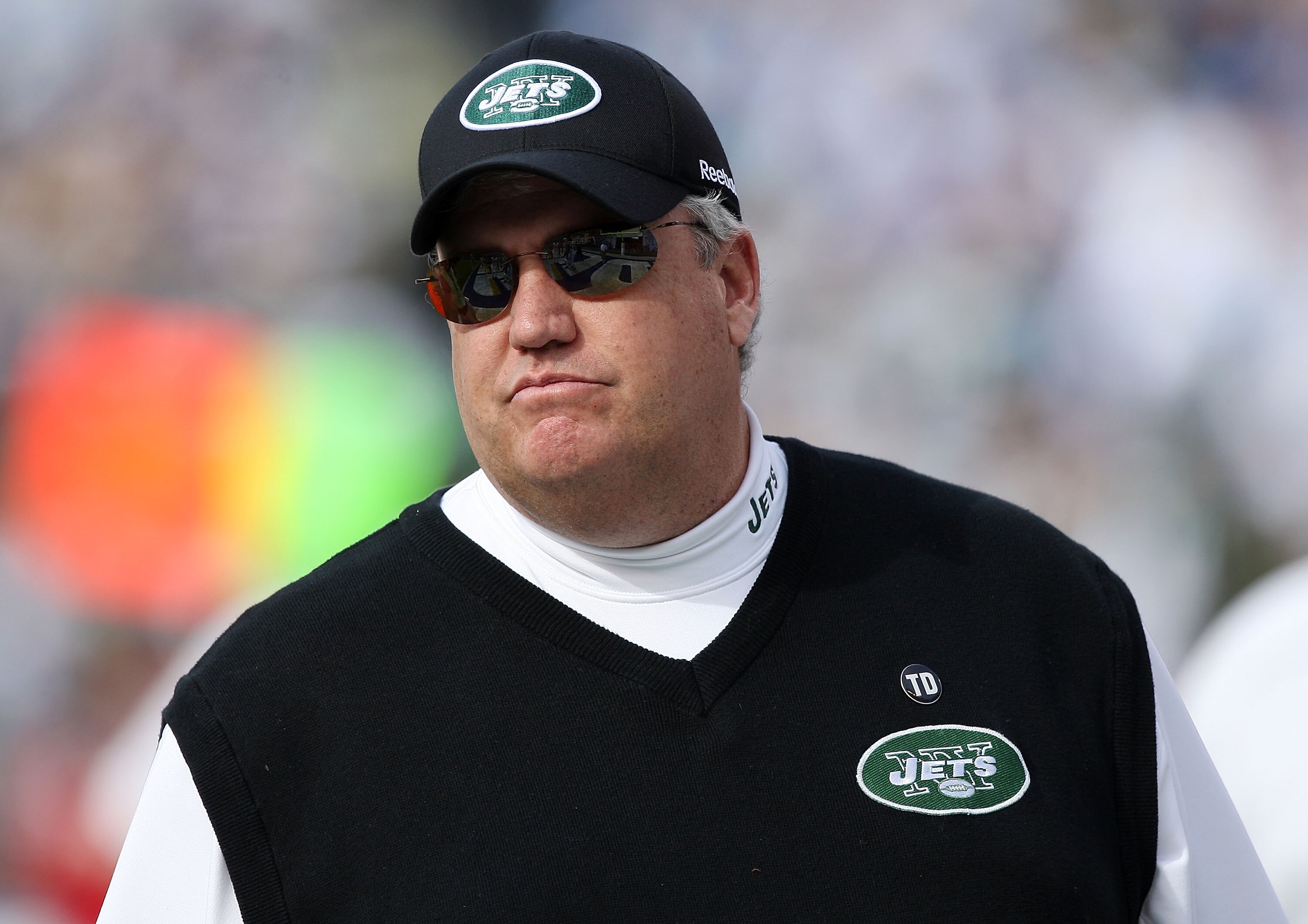 SAN DIEGO - JANUARY 17:  Head coach Rex Ryan of the New York Jets stands on the field prior to the AFC Divisional Playoff Game against the San Diego Chargers at Qualcomm Stadium on January 17, 2010 in San Diego, California.  (Photo by Donald Miralle/Getty