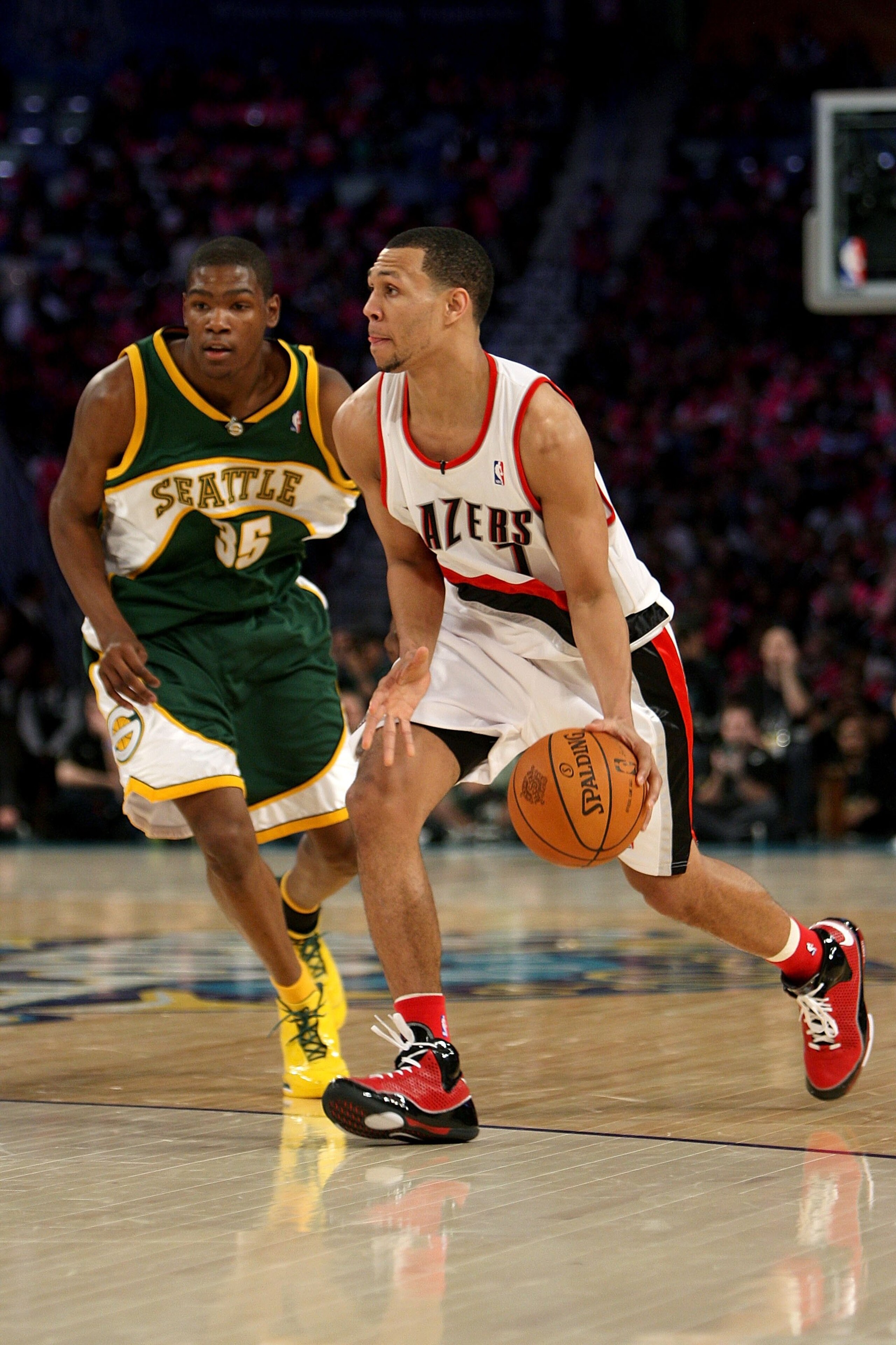 NEW ORLEANS - FEBRUARY 15:  Brandon Roy #7 of the Sophomore team drives the ball past Kevin Durant #35 of the Rookie team during the T-Mobile Rookie Challenge & Youth Jam part of 2008 NBA All-Star Weekend at the New Orleans Arena on February 15, 2008 in N