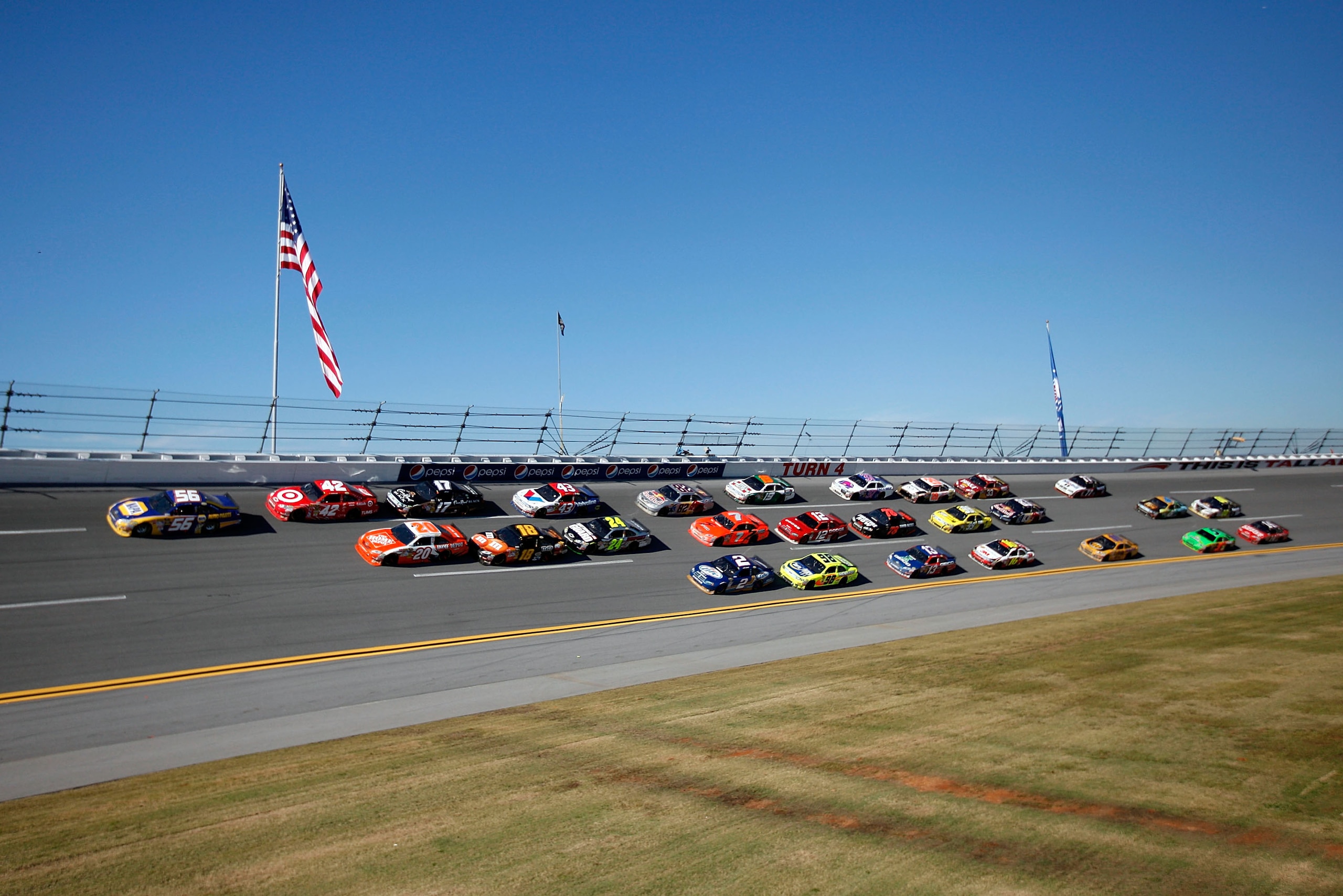 TALLADEGA, AL - OCTOBER 31: (***EDITORS NOTE*** - THIS DIGITAL IMAGE WAS CREATED WITH THE USE OF VARIABLE FOCAL PLANE LENS) Michael Waltrip, driver of the #55 Aaron's 55th Anniversary Toyota, leads a pack of cars during the NASCAR Sprint Cup Series AMP E TALLADEGA, AL - OCTOBER 31: (***EDITORS NOTE*** - THIS DIGITAL IMAGE WAS CREATED WITH THE USE OF VARIABLE FOCAL PLANE LENS) Michael Waltrip, driver of the #55 Aaron's 55th Anniversary Toyota, leads a pack of cars during the NASCAR Sprint Cup Series AMP E