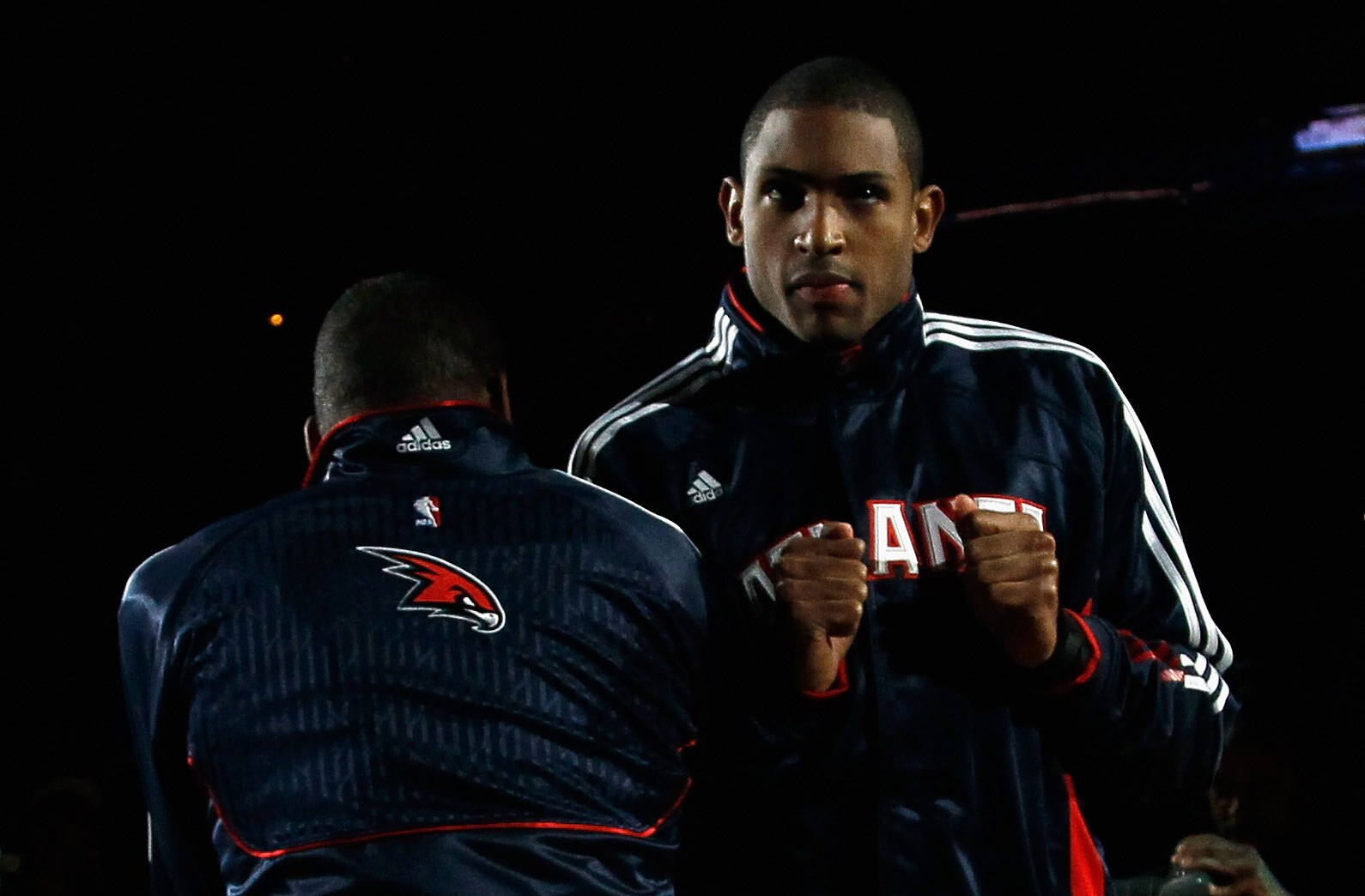 ATLANTA, GA - DECEMBER 11:  Josh Powell #12 and Al Horford #15 of the Atlanta Hawks against the Indiana Pacers at Philips Arena on December 11, 2010 in Atlanta, Georgia.  NOTE TO USER: User expressly acknowledges and agrees that, by downloading and/or usi